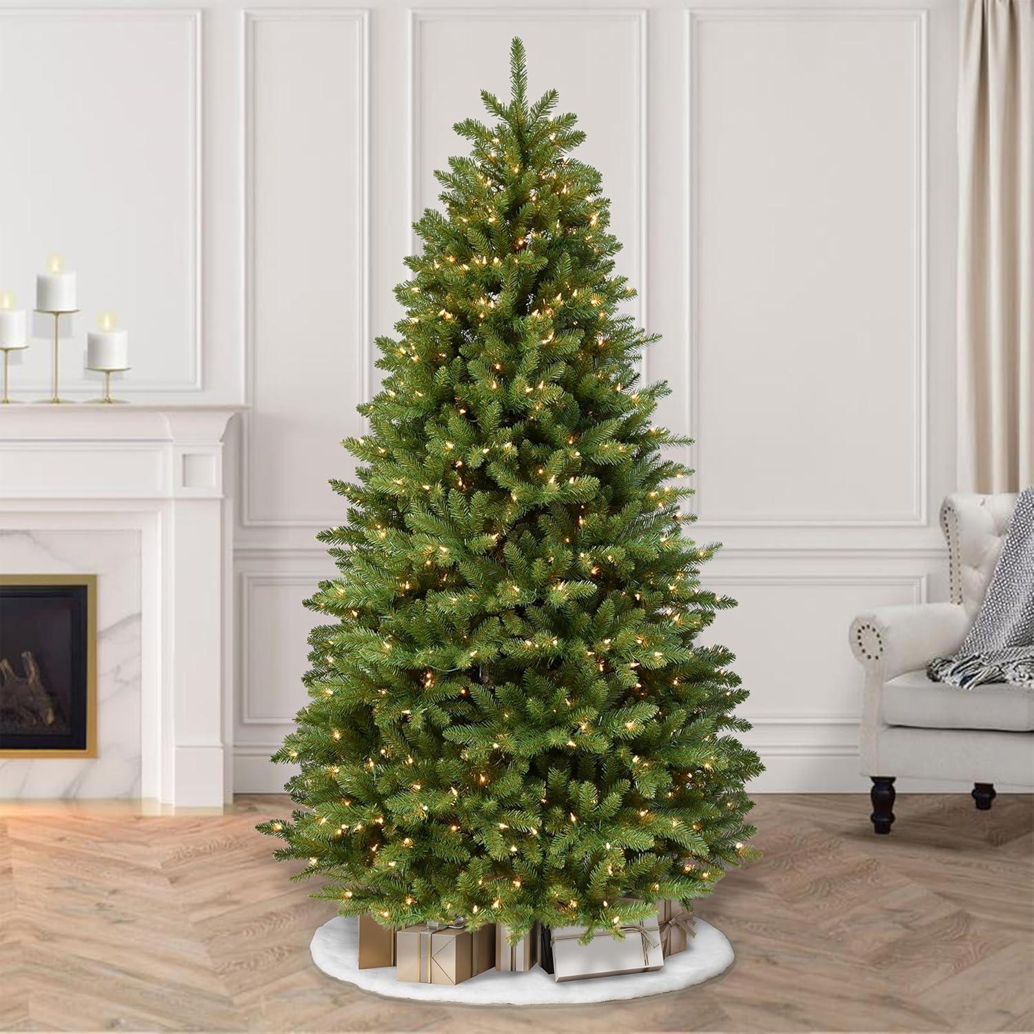 Puleo International 7.5' Pre-lit Fraser Fir Grand Tree w/ bottom row of branches near the floor Artificial Christmas Tree with 750 UL-Listed Clear Lights