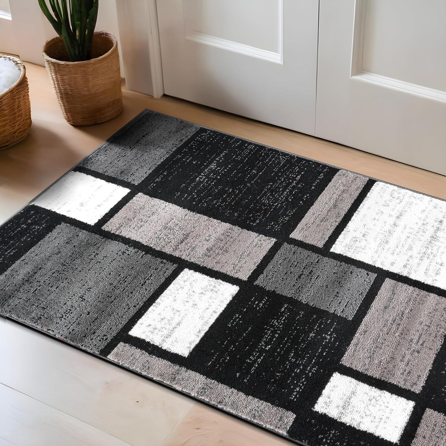 Gray and Black Geometric Pattern Oval Synthetic Rug