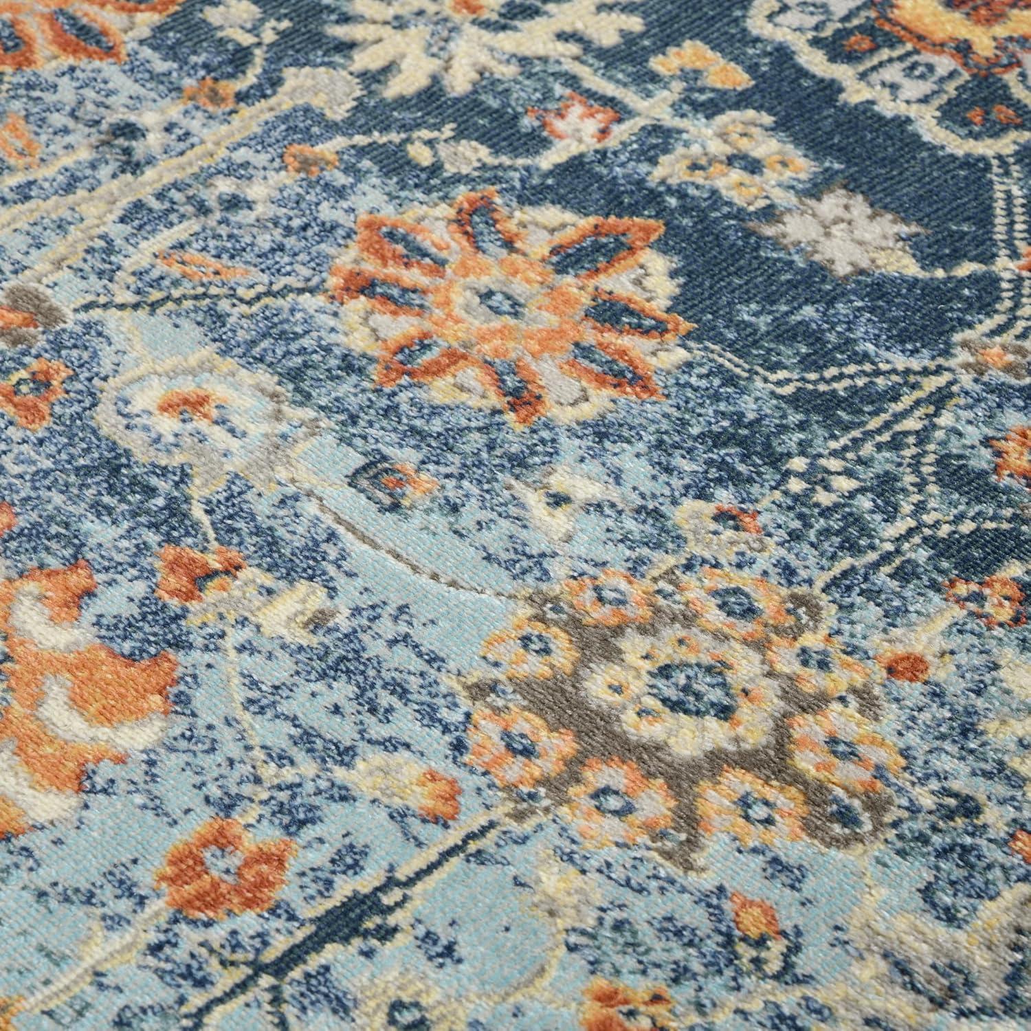 Bohemian Blue and Beige Synthetic 5' x 7' Area Rug