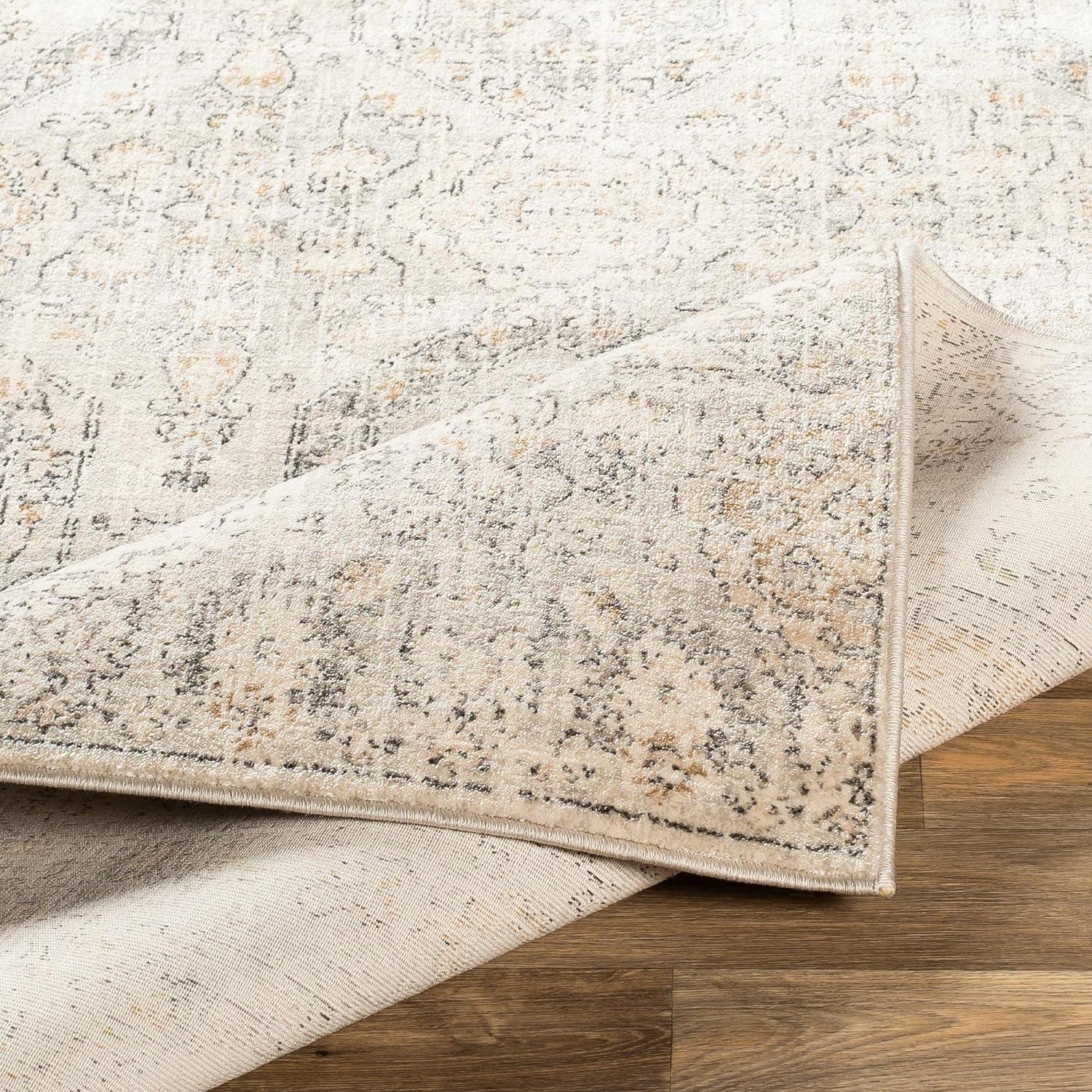 Geelbroek Traditional Tan and Ivory Polypropylene Area Rug