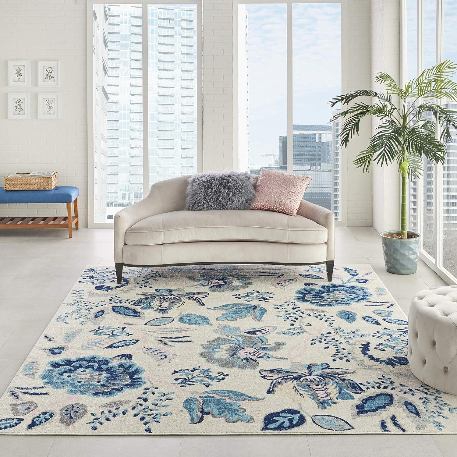 Elegant Ivory and Light Blue Floral 8' x 10' Synthetic Area Rug