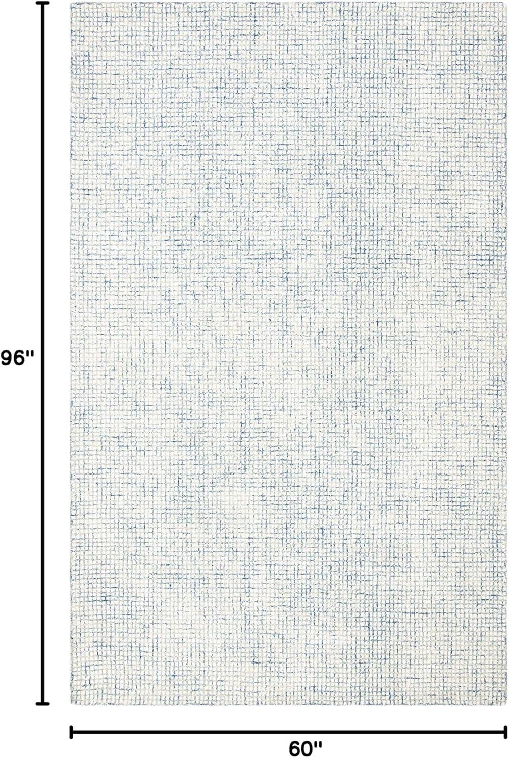 Ivory and Blue Handmade Wool Abstract Area Rug