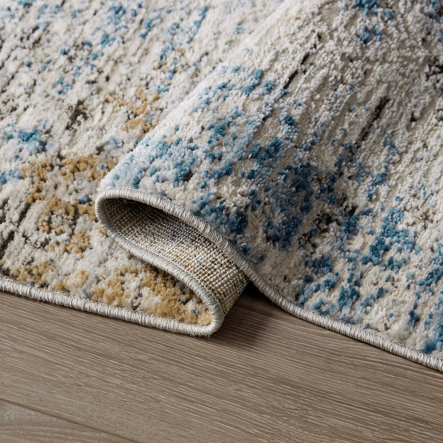 Blue Abstract 5' x 7' Stain-Resistant Synthetic Area Rug