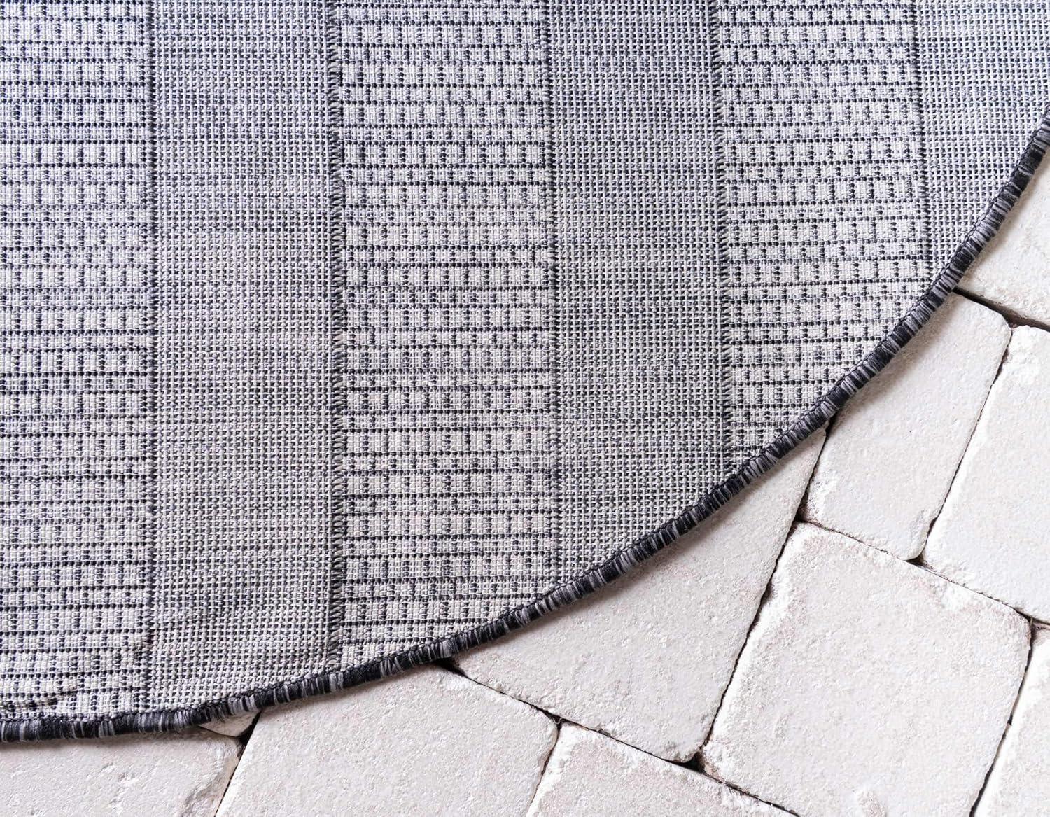 Round Gray and Black Striped Outdoor Rug