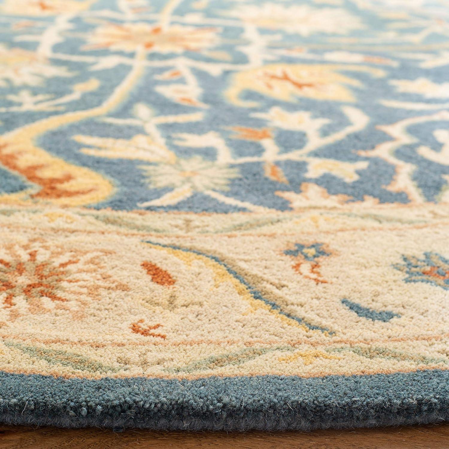 Handmade Blue Wool Oval Tufted Area Rug