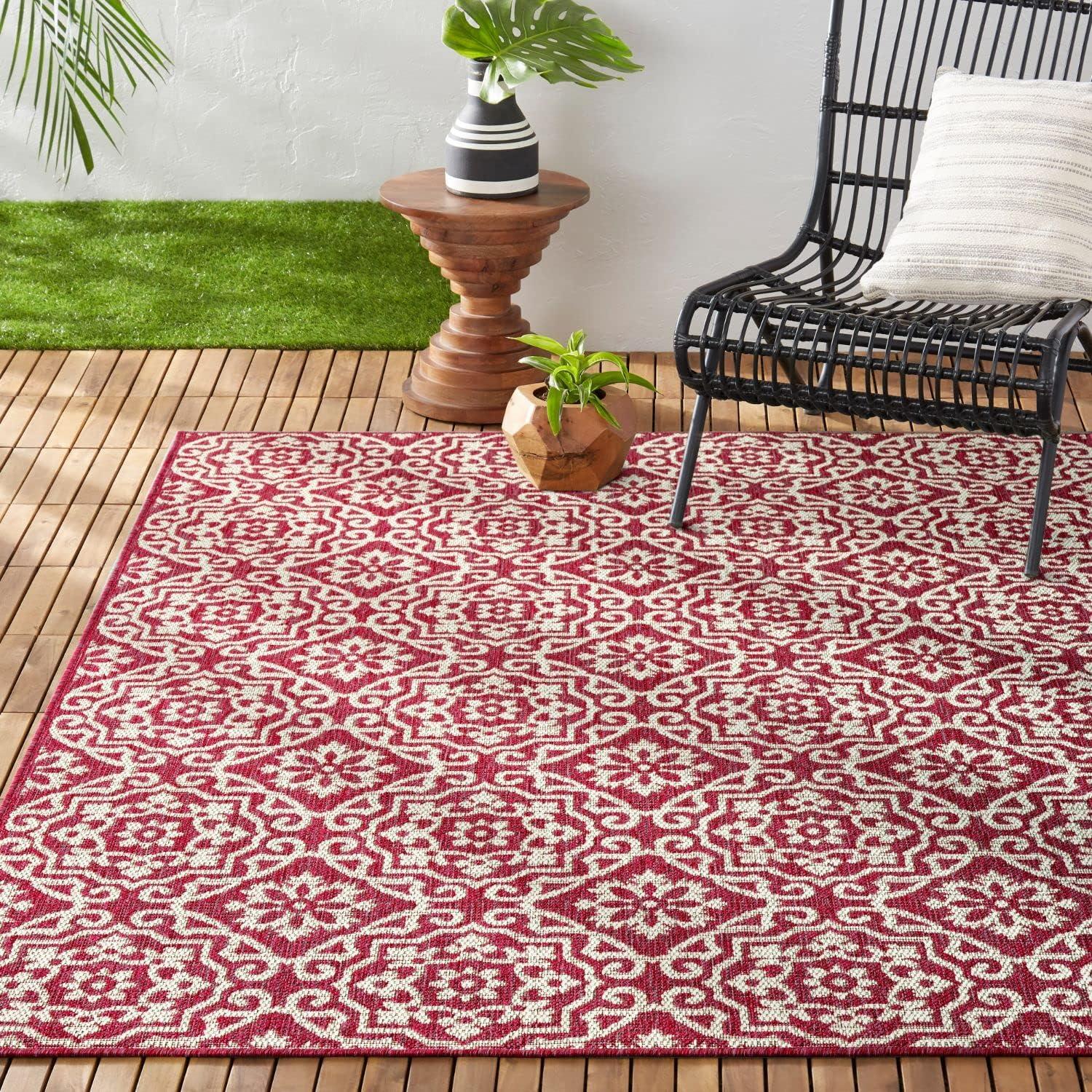 Danica Pink and Ivory Geometric Synthetic Indoor/Outdoor Rug