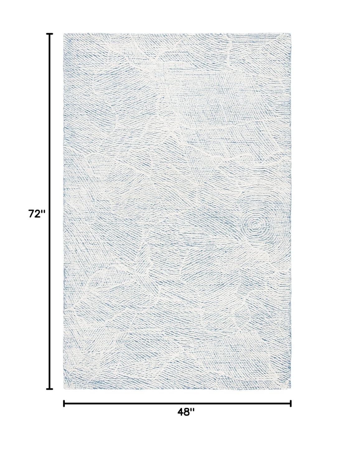 Metro MET999 Hand Tufted Indoor Area Rug - Blue/Ivory - 4'x6' - Safavieh