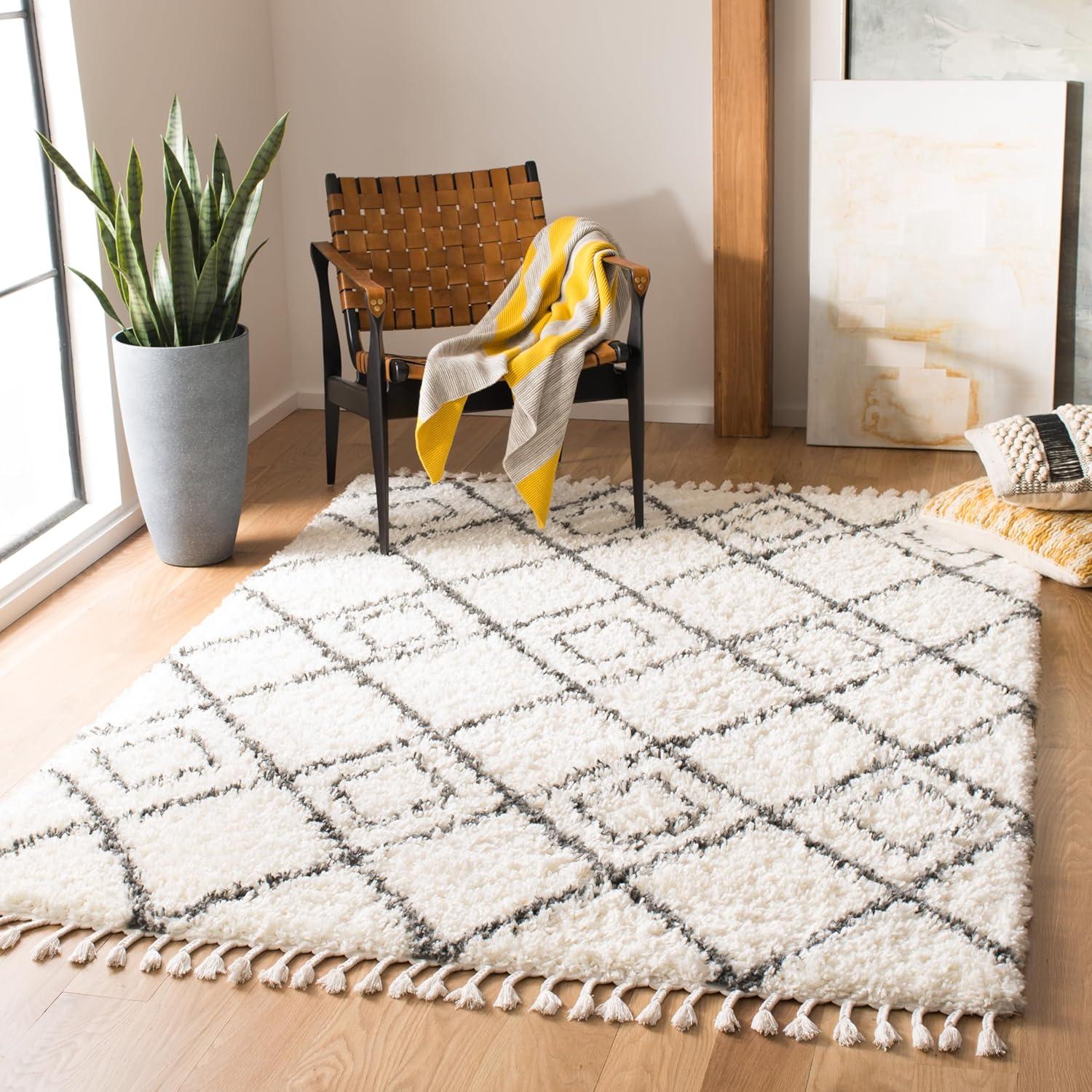 SAFAVIEH Moroccan Tassel Shag Comhgham Geometric Area Rug, Ivory/Dark Grey, 5'3" x 7'6"