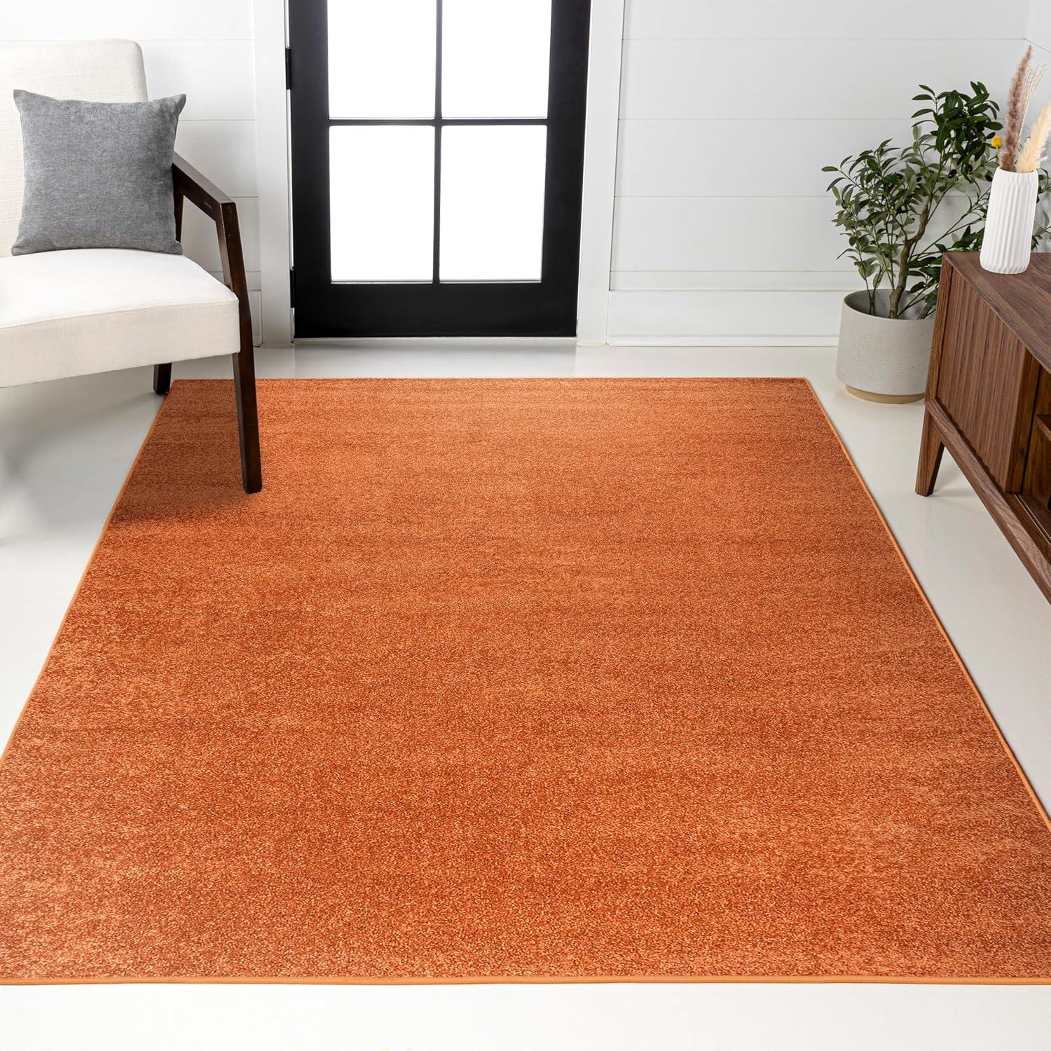 Haze Solid Low-Pile Orange 10 ft. x 14 ft. Area rug -JONATHAN Y