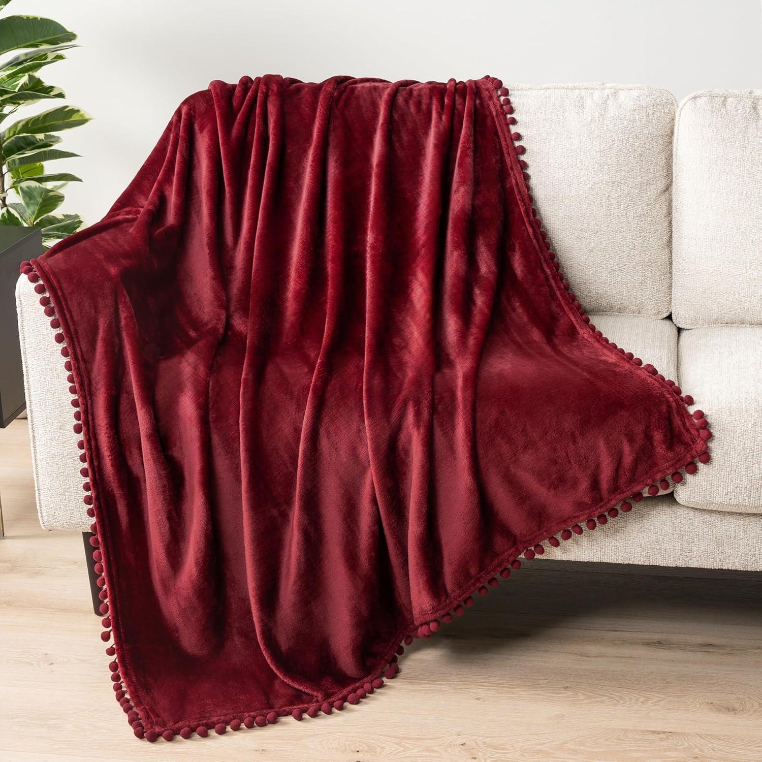 PAVILIA Fleece Throw Blanket for Couch with Pom Pom Fringe, Maroon Burgundy Red, Soft Cozy Fuzzy Flannel Blanket for Sofa Bed, Lightweight Plush All Season Throw, 50x60 Inches