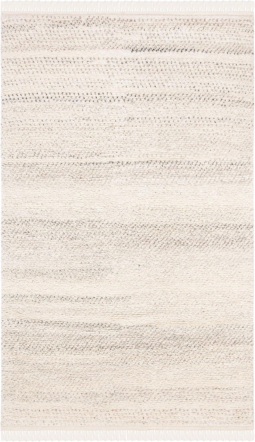 SAFAVIEH Casablanca Axel Solid Wool Shag Area Rug, Beige, 5' x 8'