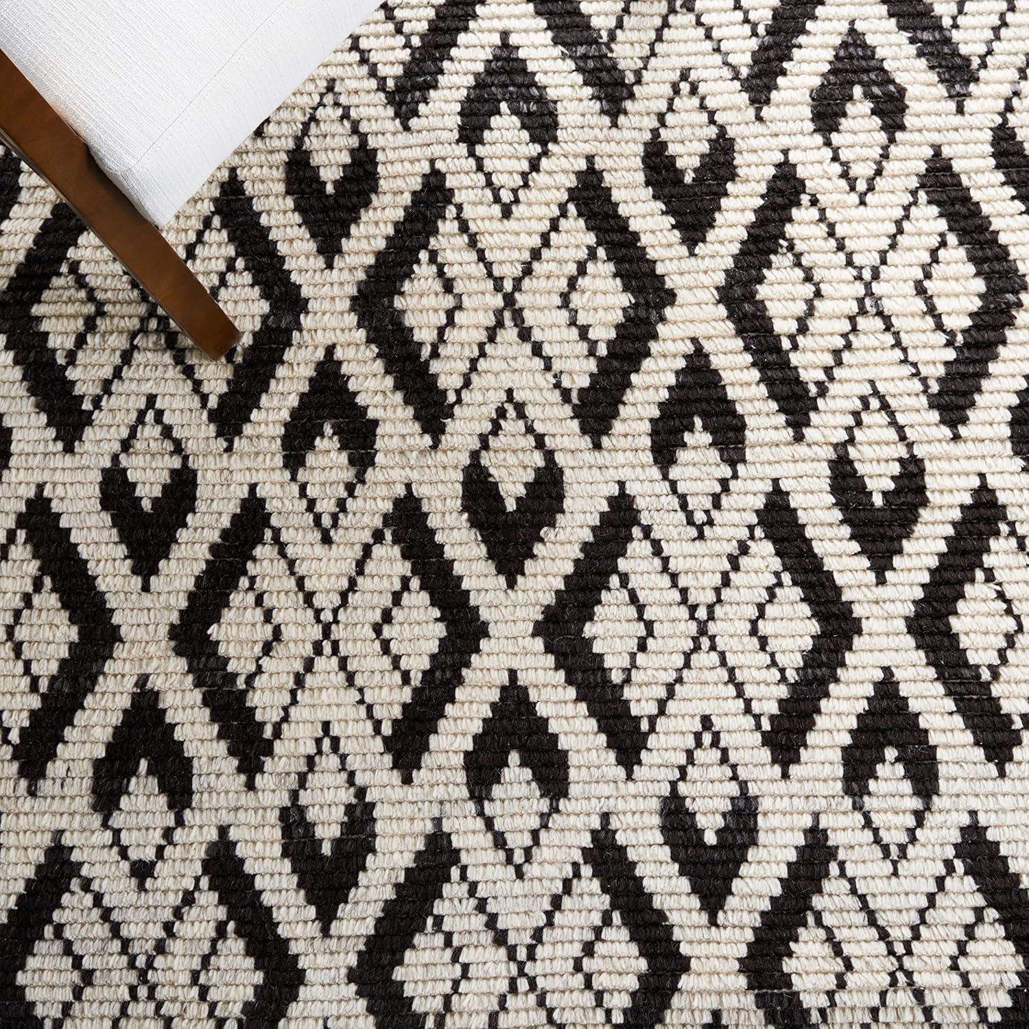 Ivory and Black Hand-Knotted Wool 6' x 9' Area Rug