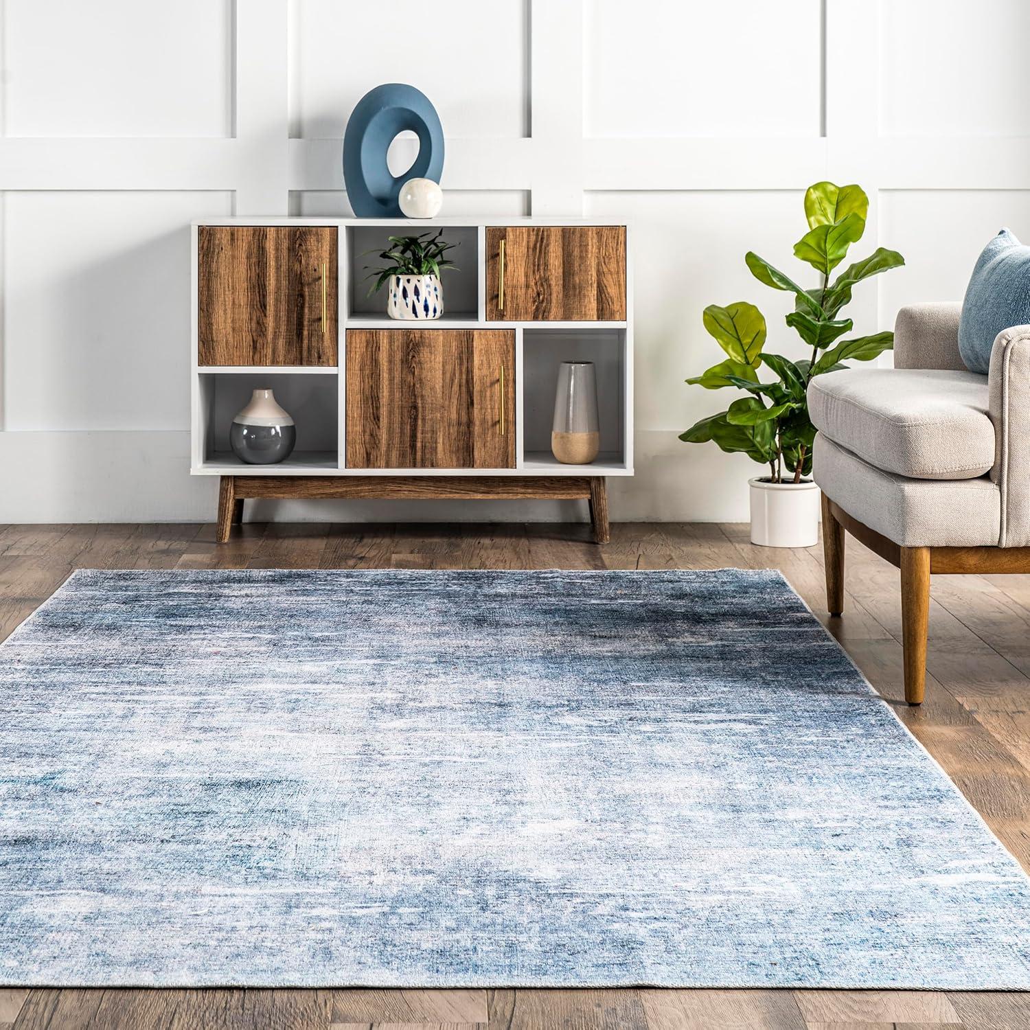 Sustainably-Sourced Blue Abstract 5' x 8' Washable Area Rug