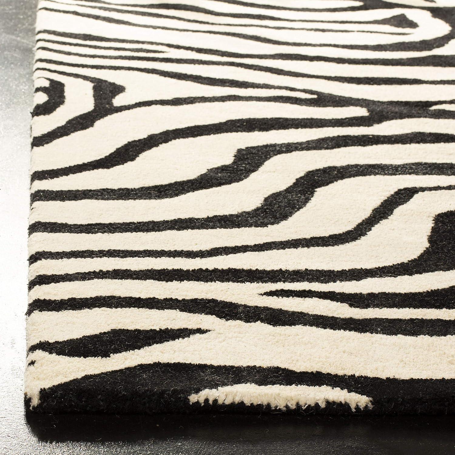 Handmade Black and White Tufted Wool Area Rug, 6' x 9'