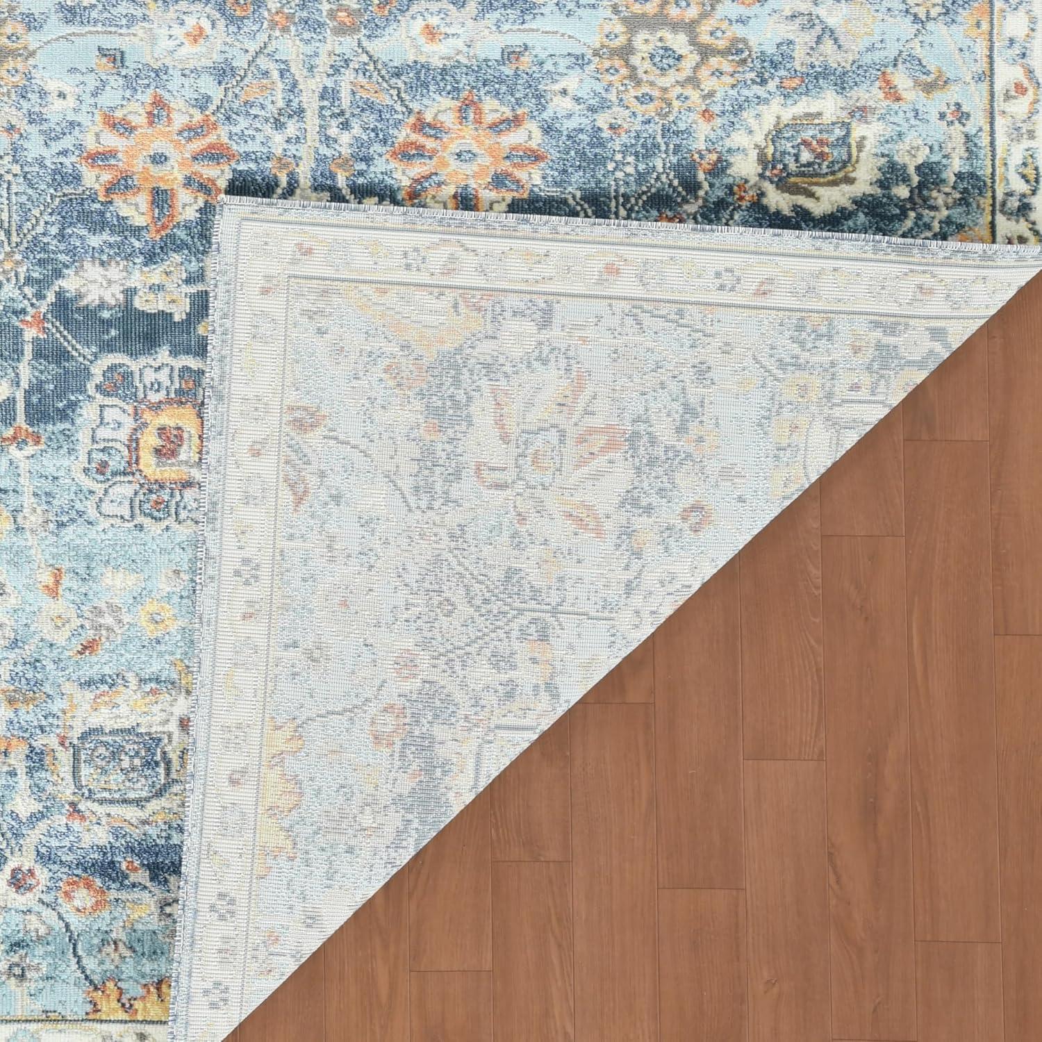 Bohemian Blue and Beige Synthetic 5' x 7' Area Rug