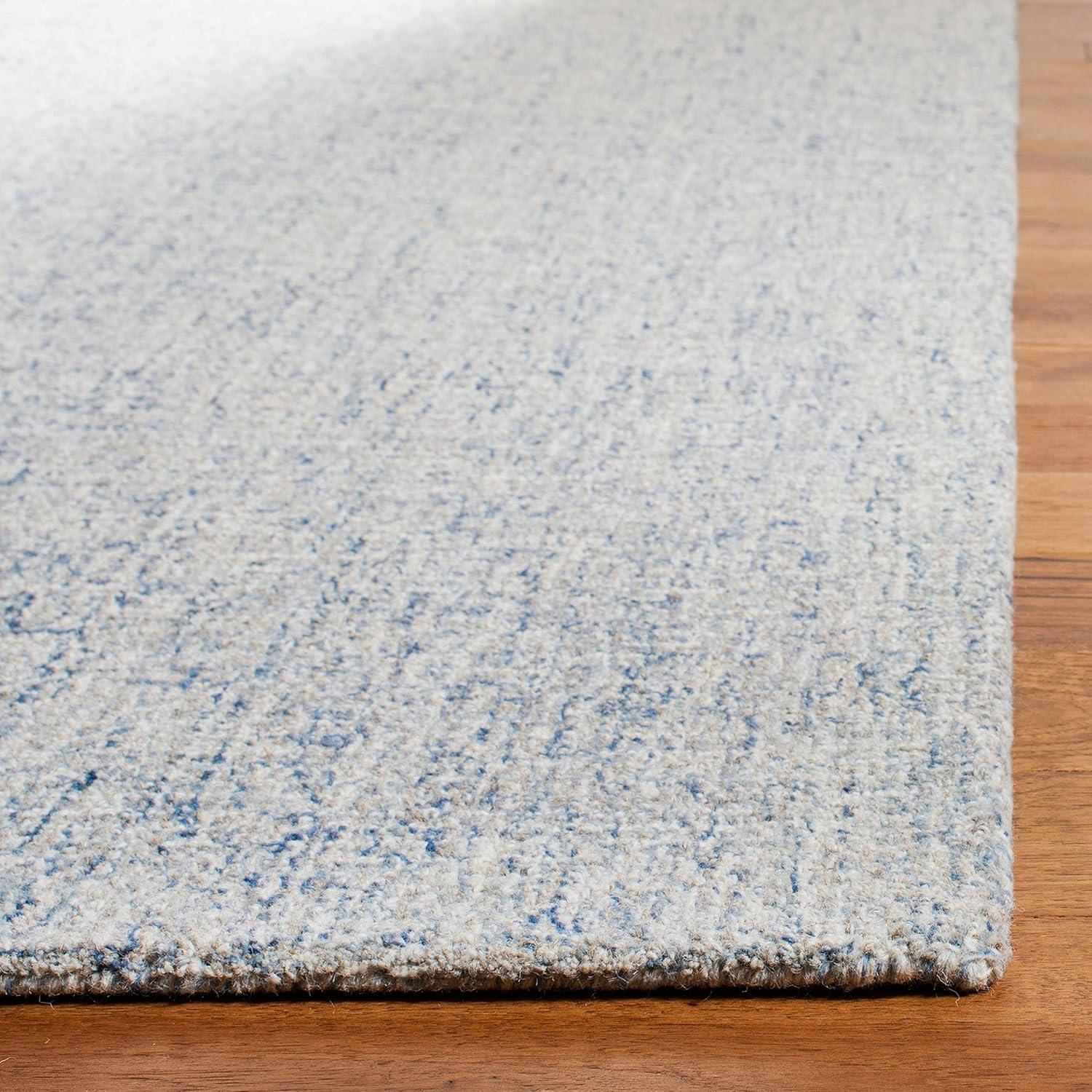 SAFAVIEH Abstract Emely Distressed Wool Area Rug, Ivory/Blue, 9' x 12'