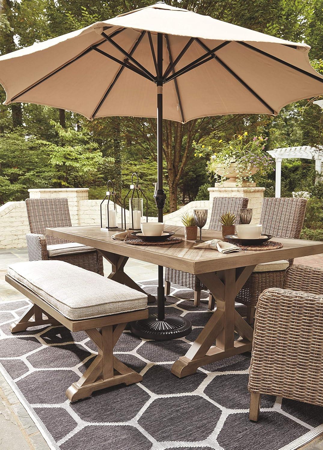 Ashley Furniture Beachcroft Trestle Patio Dining Table in Beige