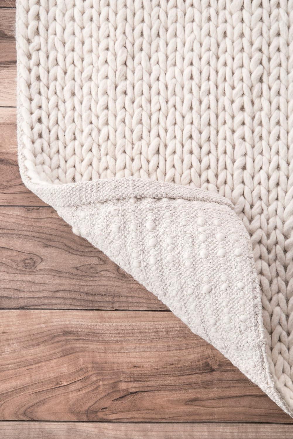 Handmade Off White Wool Oval Braided Rug 10' x 14'