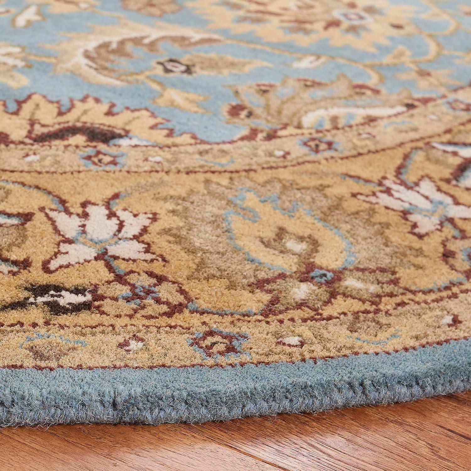 SAFAVIEH Heritage Collection Area Rug - 6' Round, Blue & Gold, Handmade Traditional Oriental Wool, Ideal for High Traffic Areas in Living Room, Bedroom (HG958A)