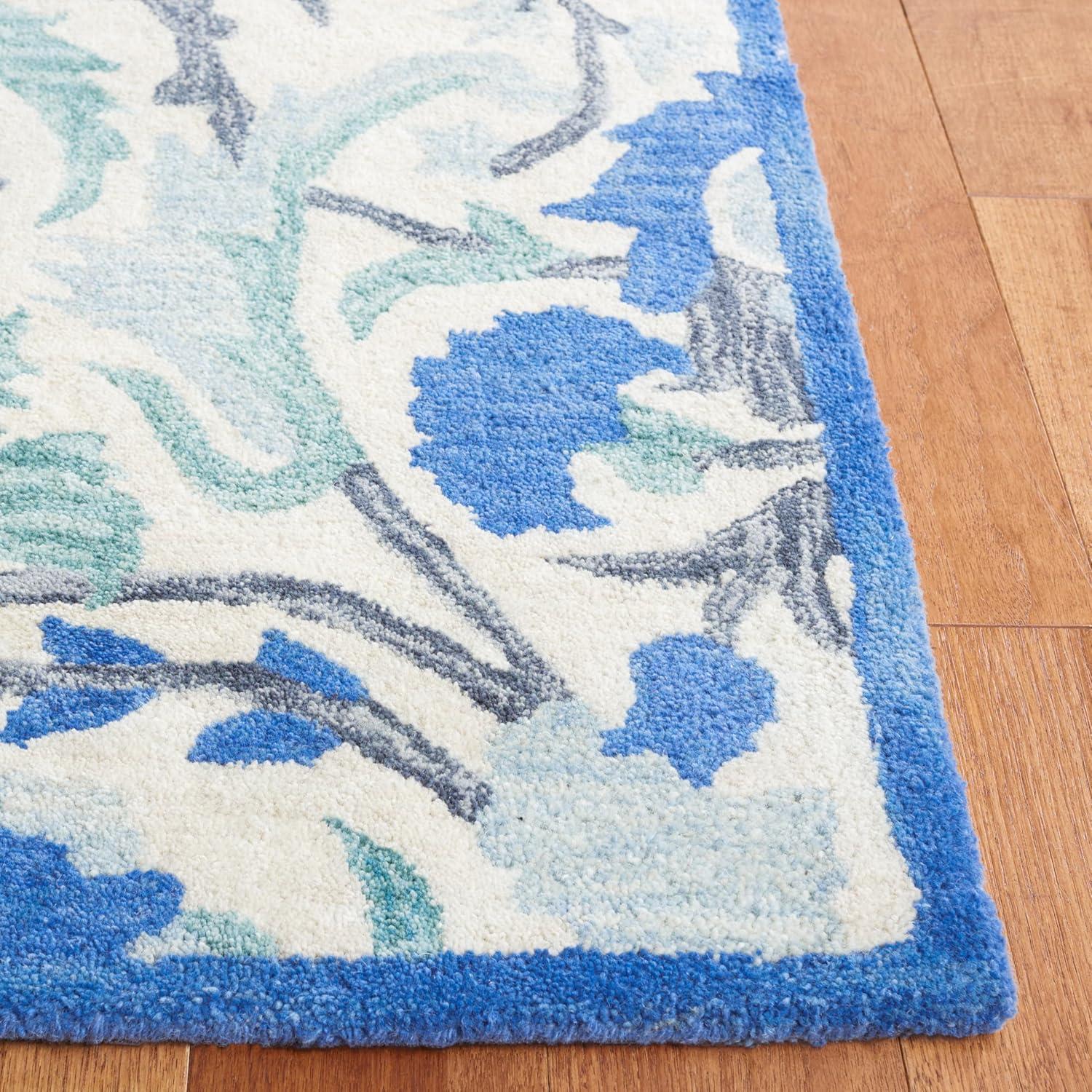 Antiquity AT59 Hand Tufted Area Rug - Ivory/Blue - 5'x8' - Safavieh.