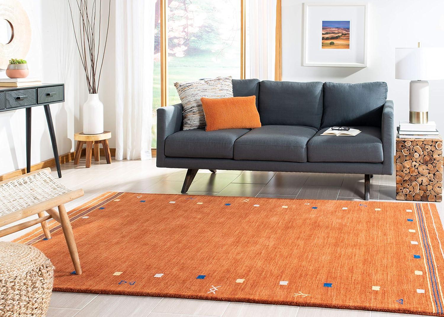 SAFAVIEH Himalaya Charmaine Solid Wool Area Rug, Blue, 6' x 9'