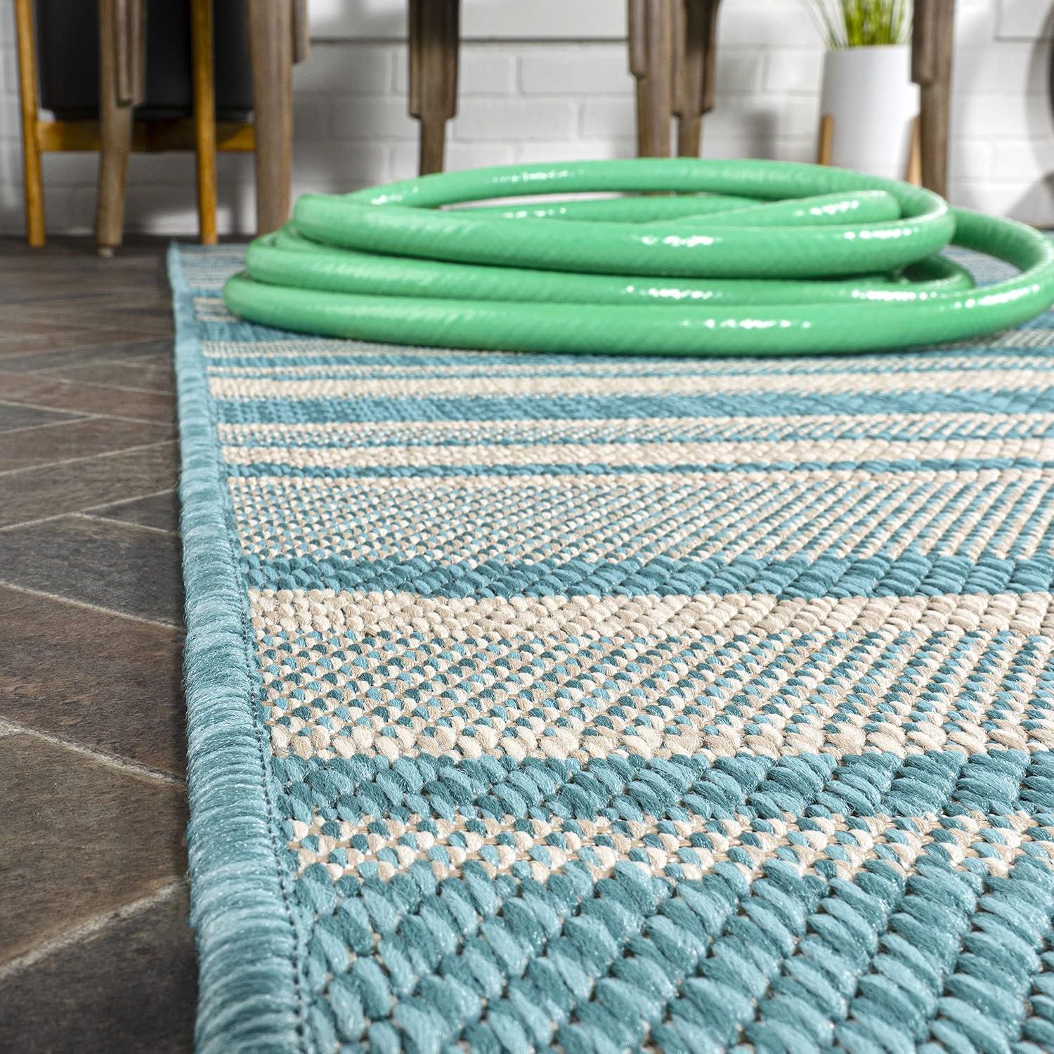 4' x 6' Castara Wavy Stripe Modern Indoor/Outdoor Area Rug, Aqua/Cream - JONATHAN Y