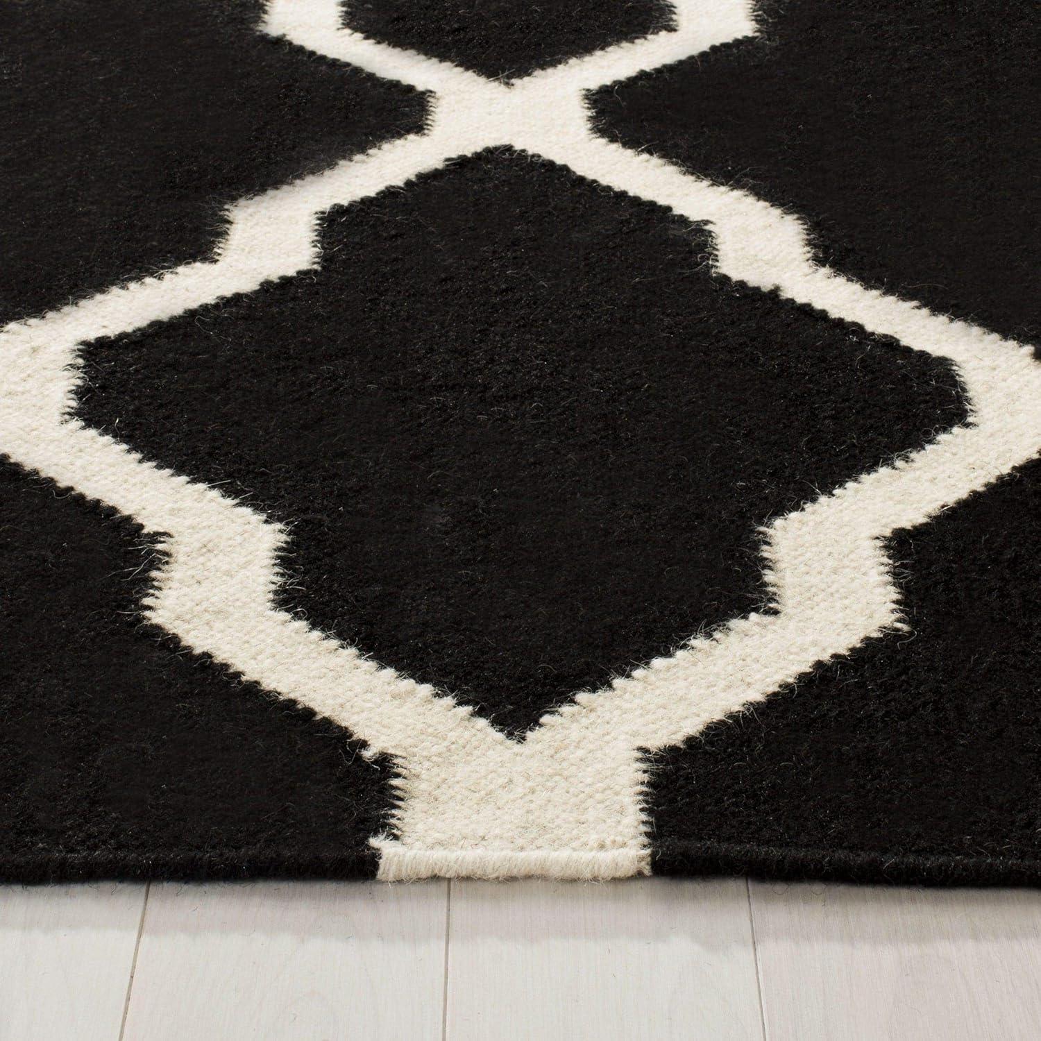 Dhurries DHU634 Hand Woven Area Rug - Black/Ivory - 5'x8' - Safavieh.
