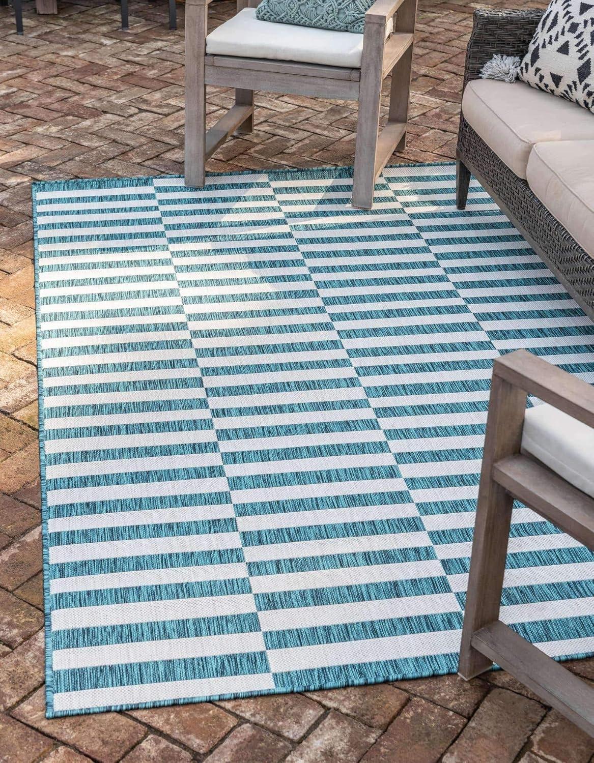 Teal and Ivory Stripe Easy-Care Outdoor Rug 5'1" x 8' Rectangular Synthetic