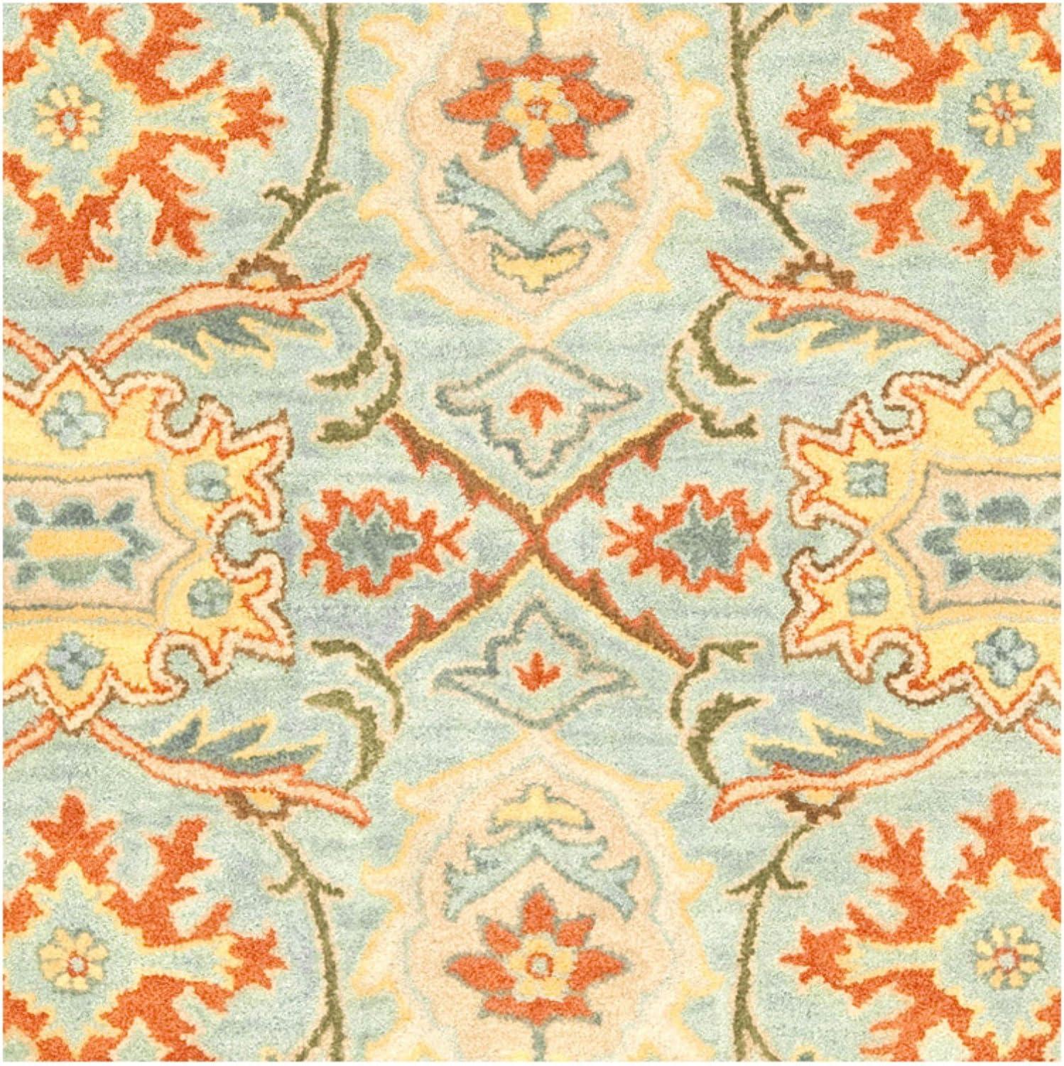 SAFAVIEH Heritage Giles Traditional Wool Area Rug, Light Blue/Ivory, 4' x 6'