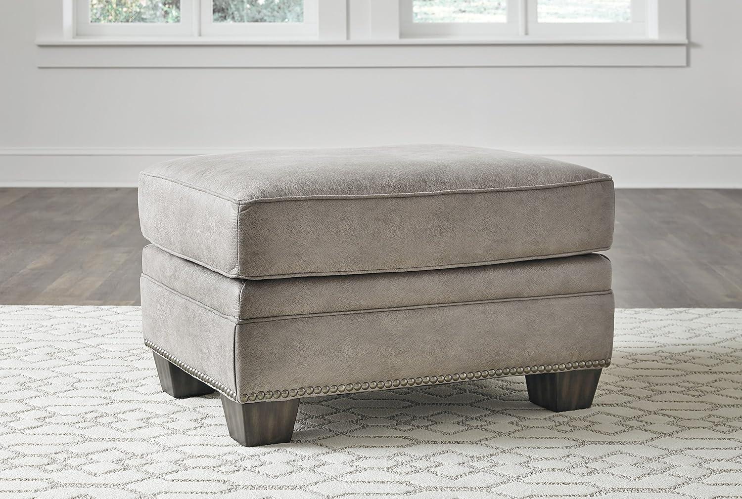 Signature Design by Ashley Traditional Olsberg Ottoman Faux Leather Steel