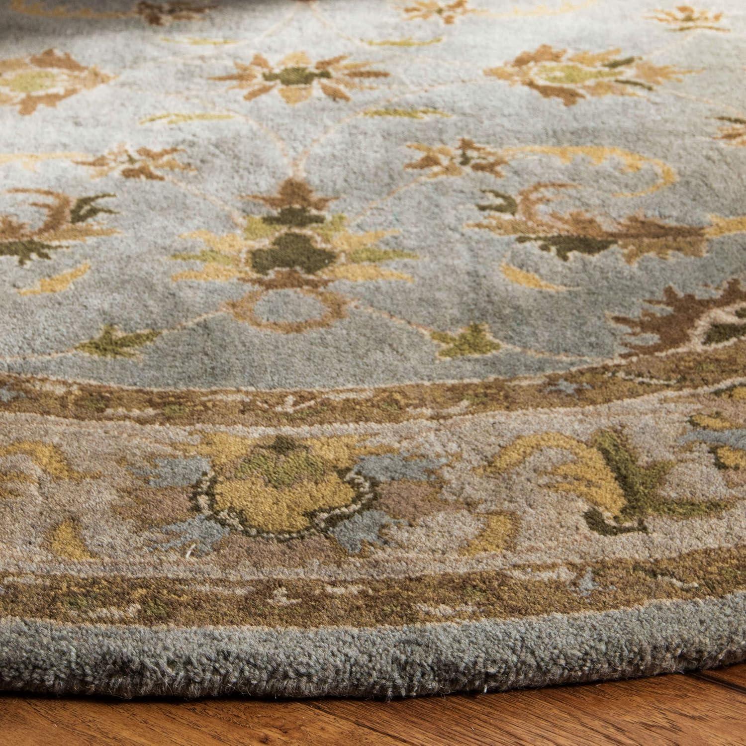 Heritage HG913 Hand Tufted Area Rug - Light Blue/Beige - 4'6"x6'6" Oval - Safavieh.