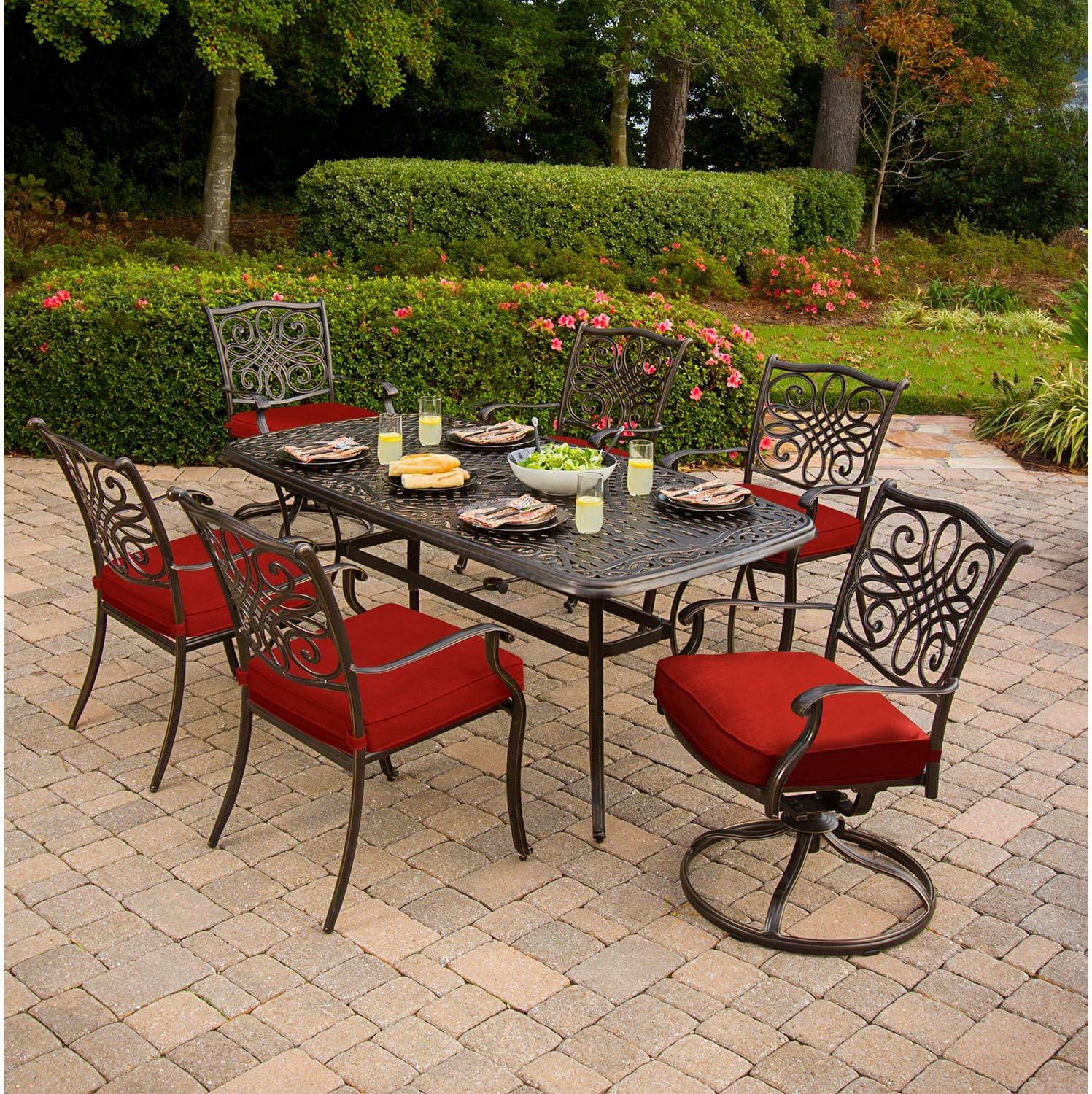 Hanover Traditions 7-Piece Outdoor Dining Set with Cast-Top Table, 2 Swivel Rockers, 4 Stationary Chairs