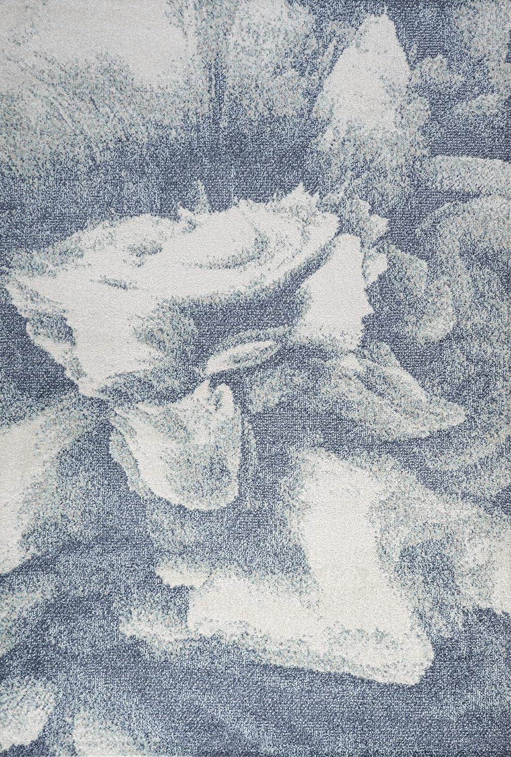 Blue and Cream Abstract Synthetic 8' x 10' Reversible Area Rug