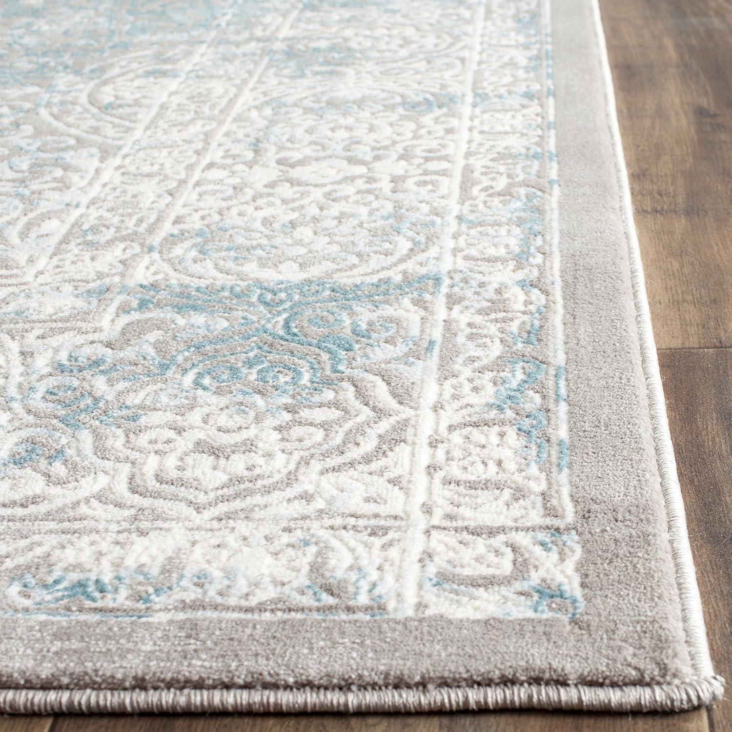 Elysian Ivory & Turquoise 9' x 12' Synthetic Reversible Area Rug