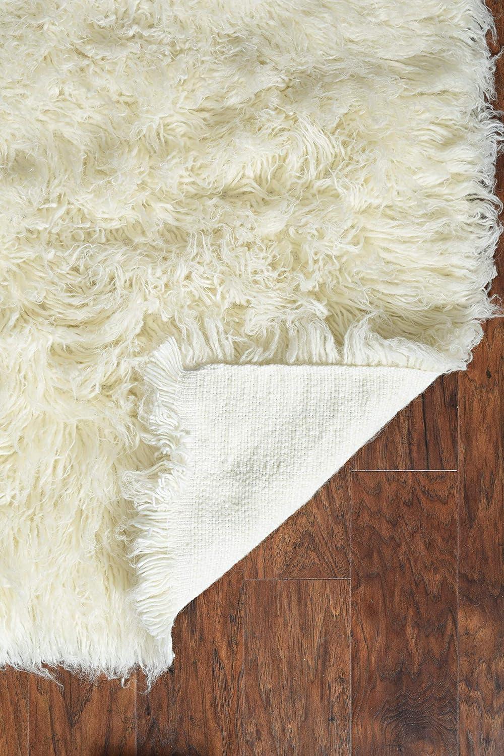 Ebern Designs Aaiden Flokati Wool Shag Hand Loomed Ivory Rug