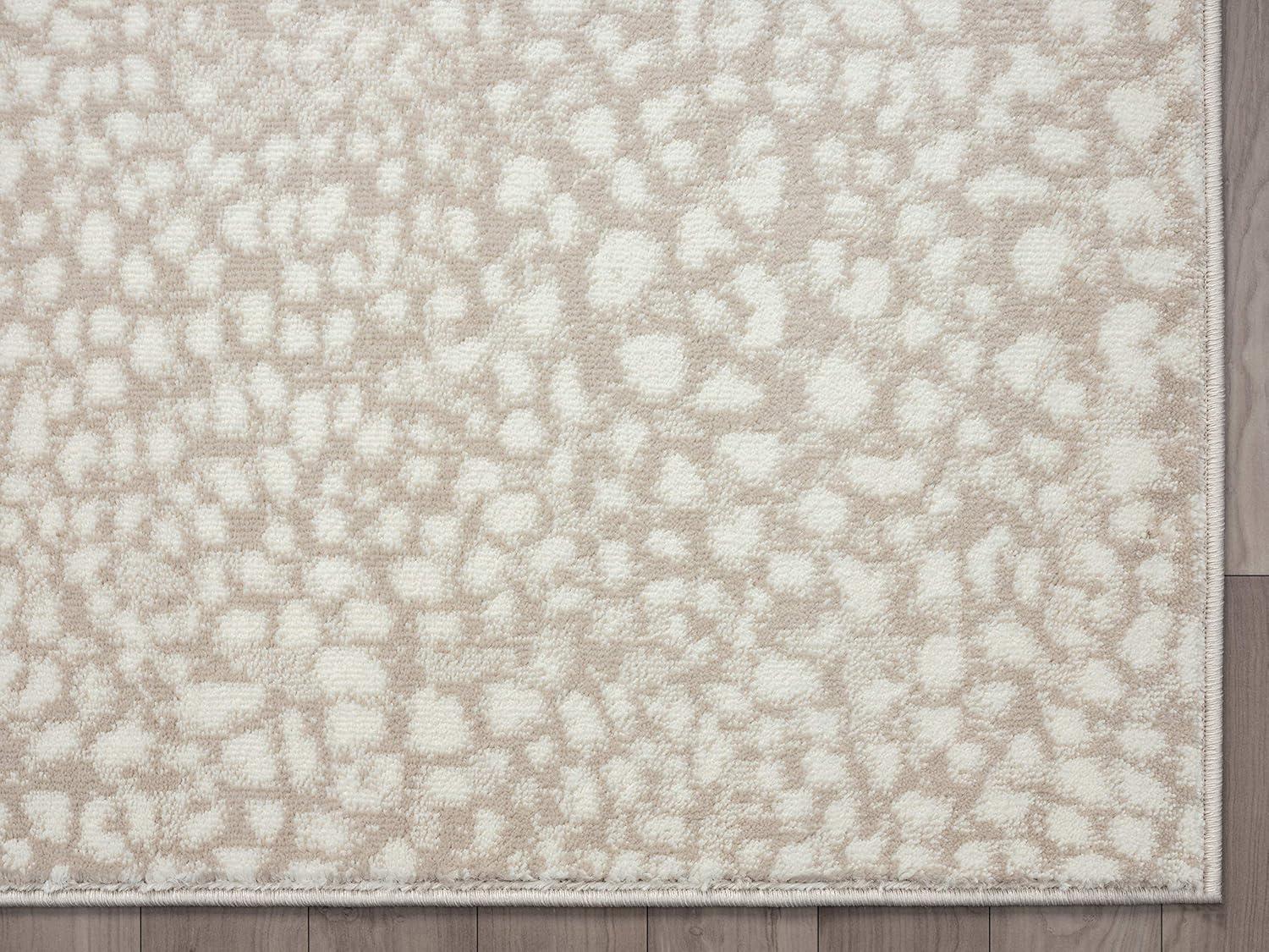 Ivory Elegance 6' x 9' Synthetic Stain-Resistant Area Rug