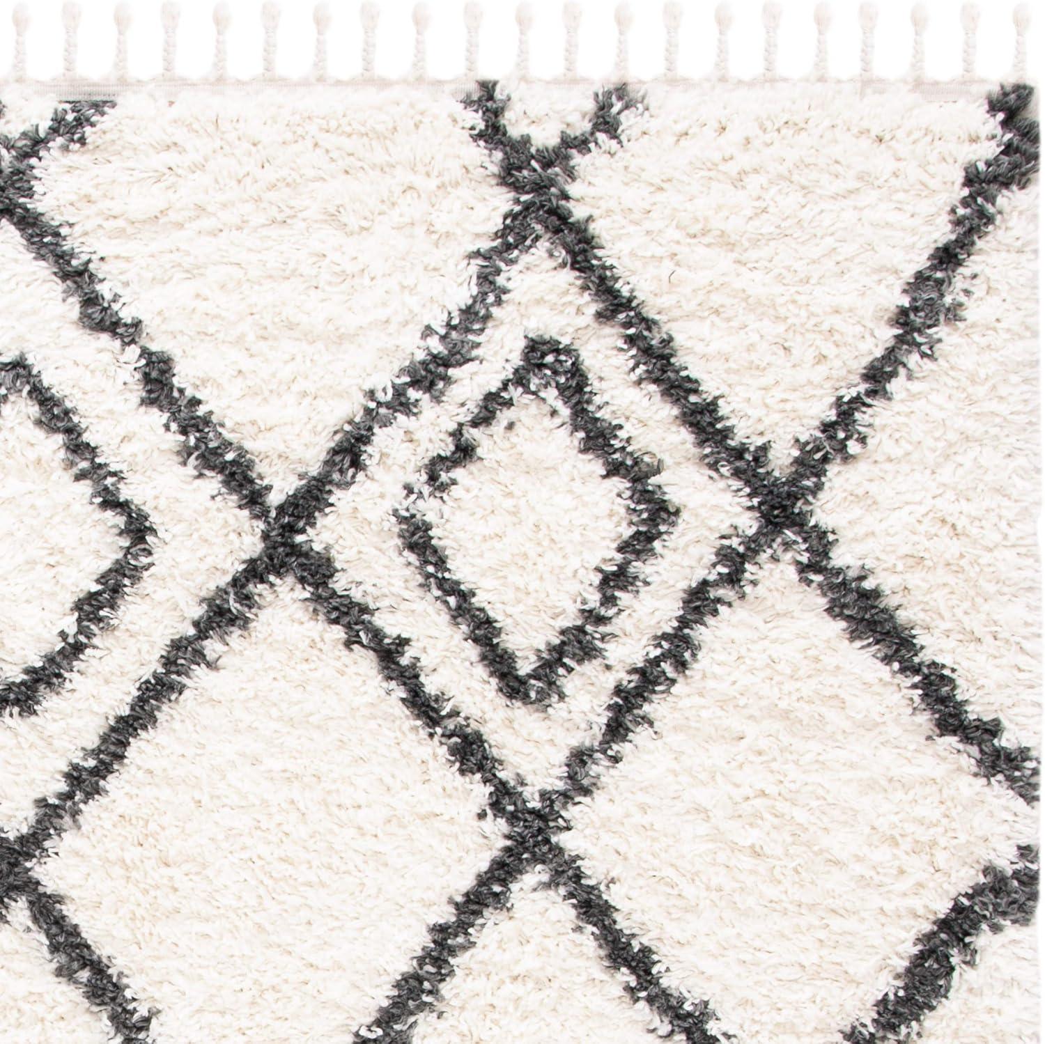 SAFAVIEH Moroccan Tassel Shag Comhgham Geometric Area Rug, Ivory/Dark Grey, 5'3" x 7'6"