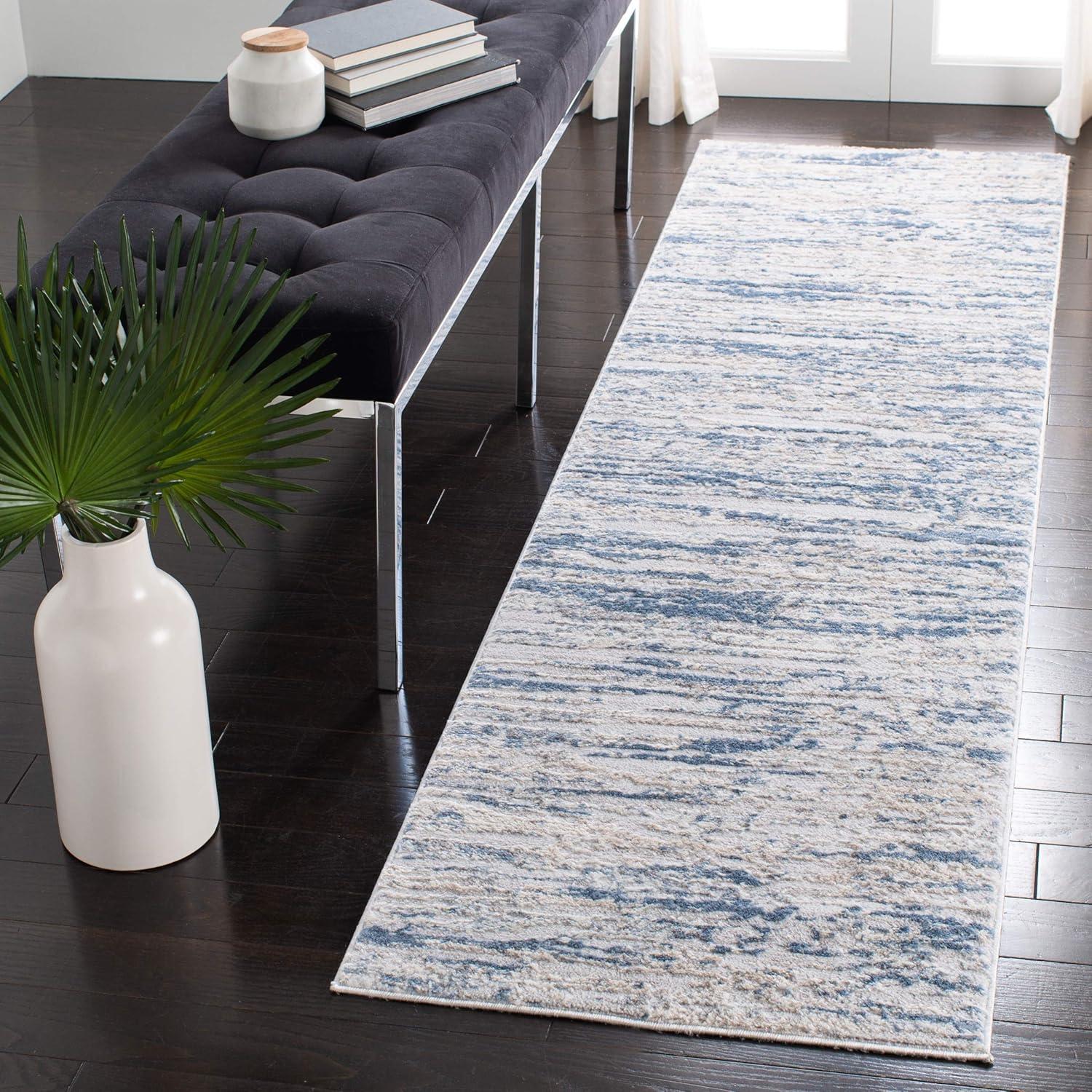 Ivory and Blue Abstract Distressed 2'2" x 4' Area Rug