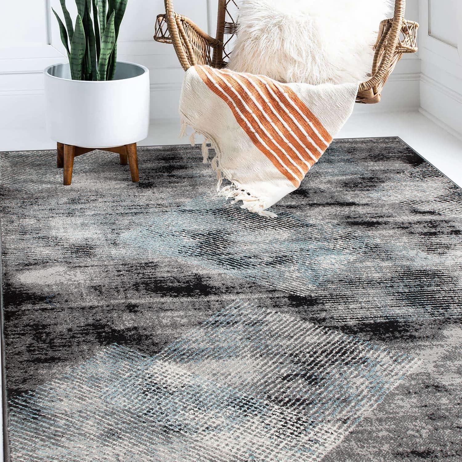 Reversible Geometric Black Synthetic 5' x 7' Area Rug