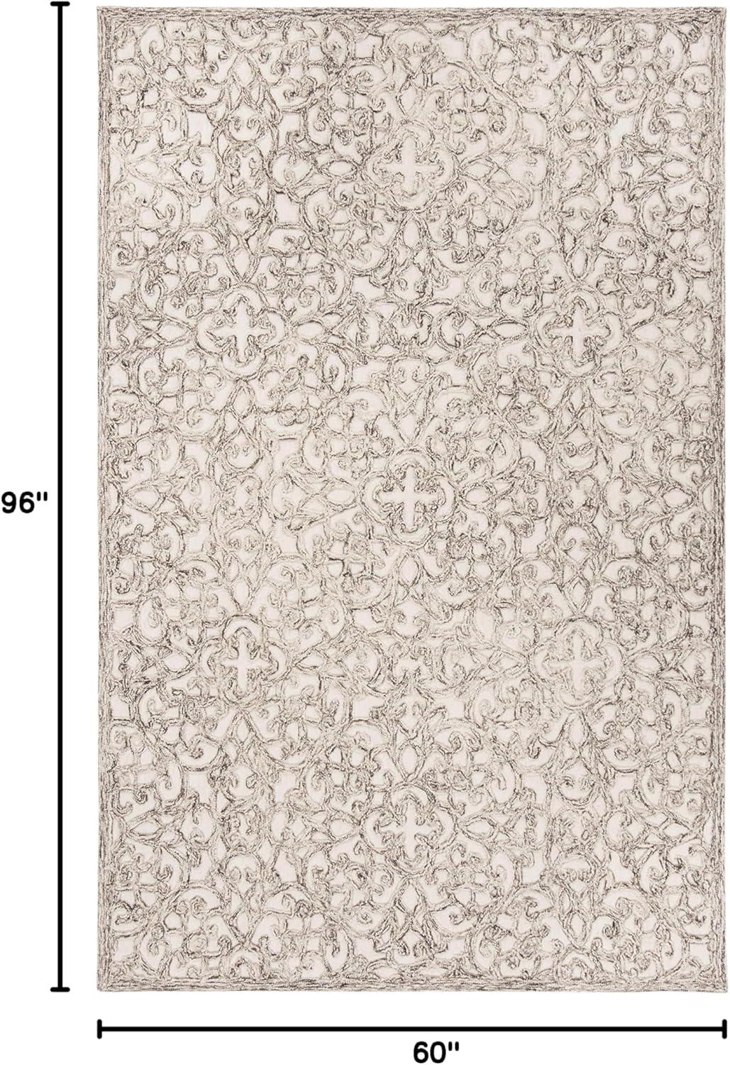 Trace TRC103 Hand Tufted Indoor Area Rug - Brown/Ivory - 5'x8' - Safavieh