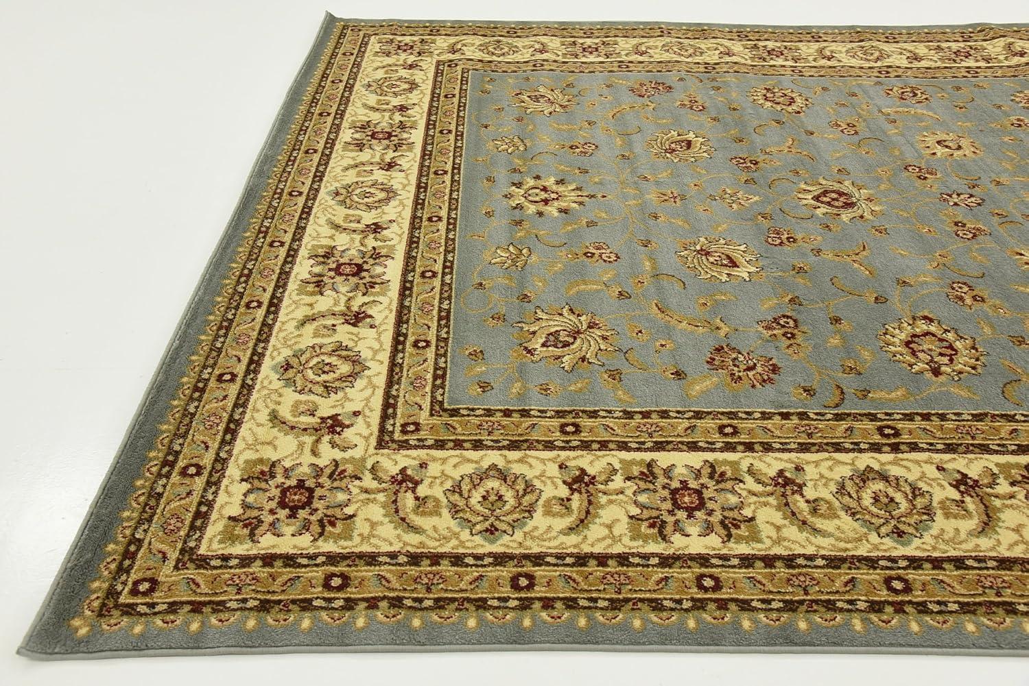 Light Blue and Cream Synthetic 9' x 12' Traditional Area Rug