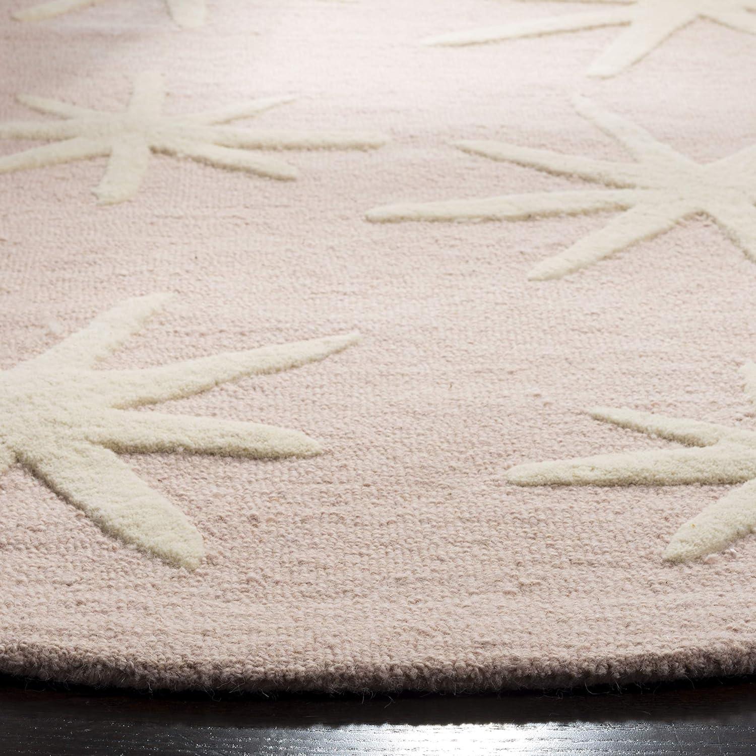 Safavieh Kids SFK908 Hand Tufted Area Rug - Pink/Ivory - 5' round - Safavieh.