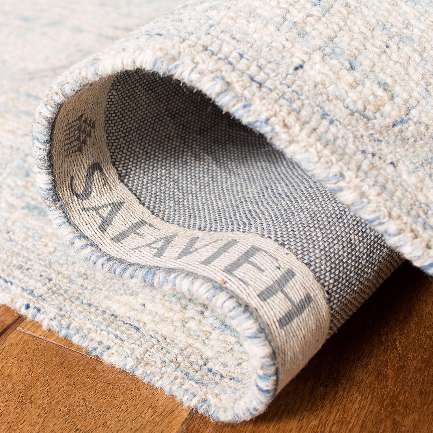 Abstract ABT474 Handmade Indoor Area Rug - Ivory/Light Blue - 6'x9' - Safavieh