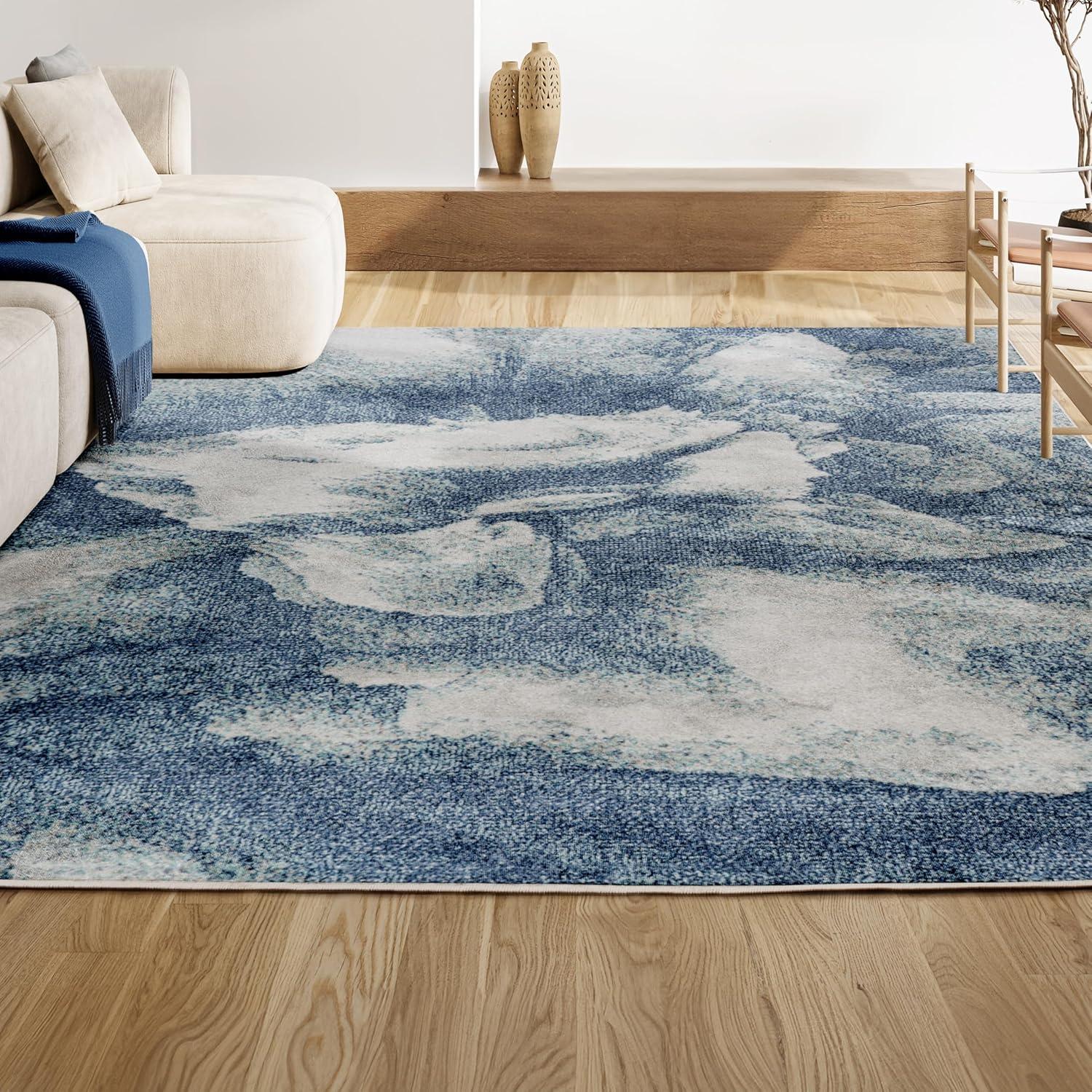 Blue and Cream Abstract Synthetic 8' x 10' Reversible Area Rug
