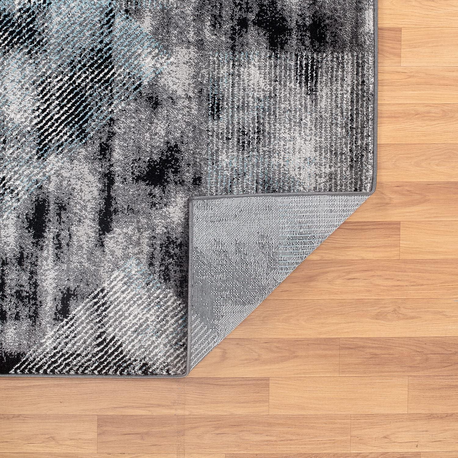 Reversible Geometric Black Synthetic 5' x 7' Area Rug