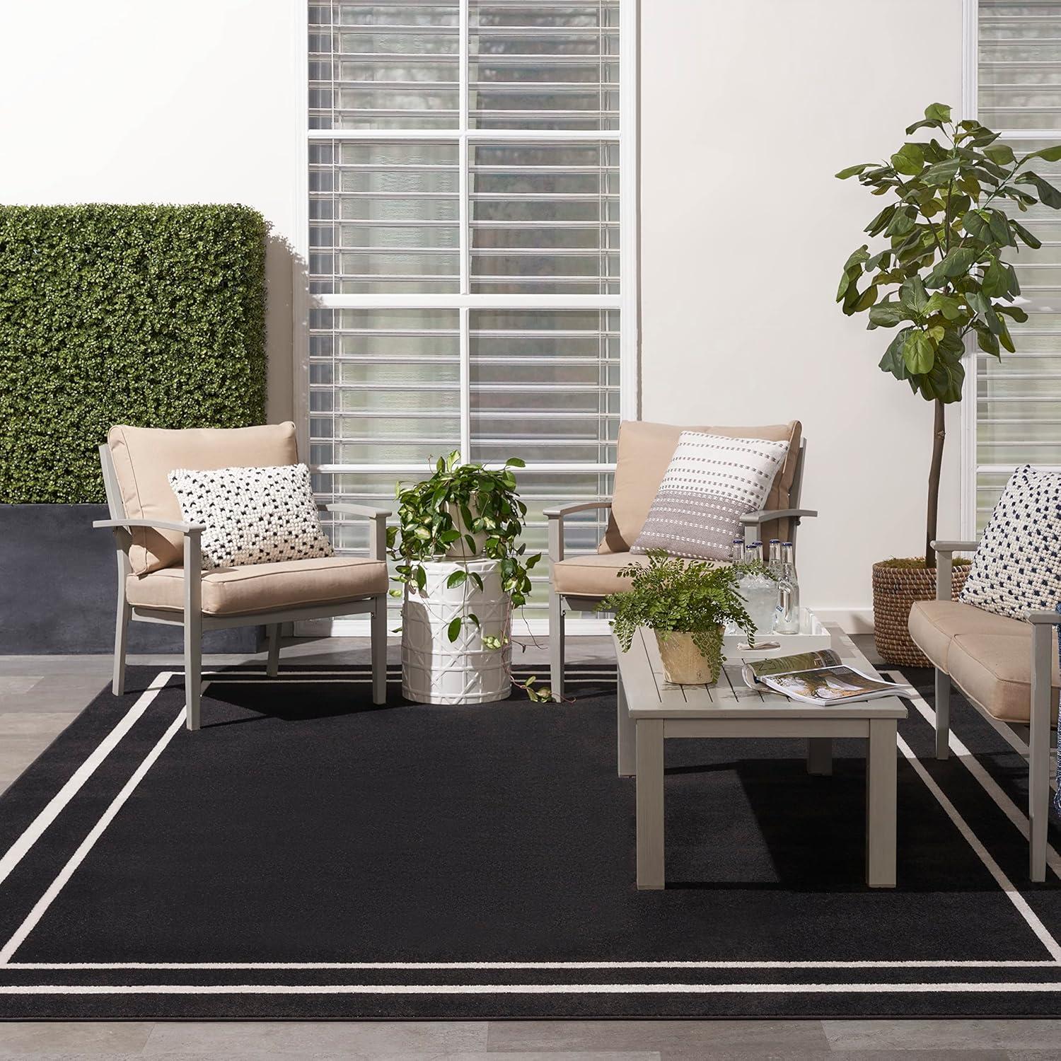 Nourison Essentials 9' x 12' Black Ivory Contemporary Indoor/Outdoor Rug
