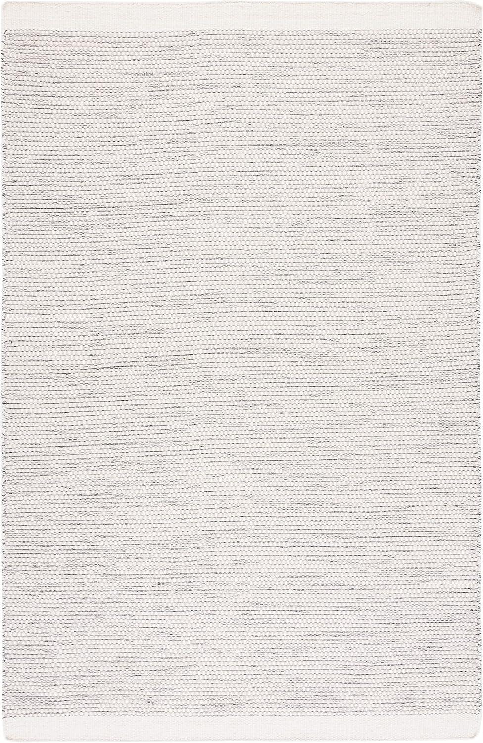 Ivory and Black Flat Woven Wool Area Rug, 4' x 6'