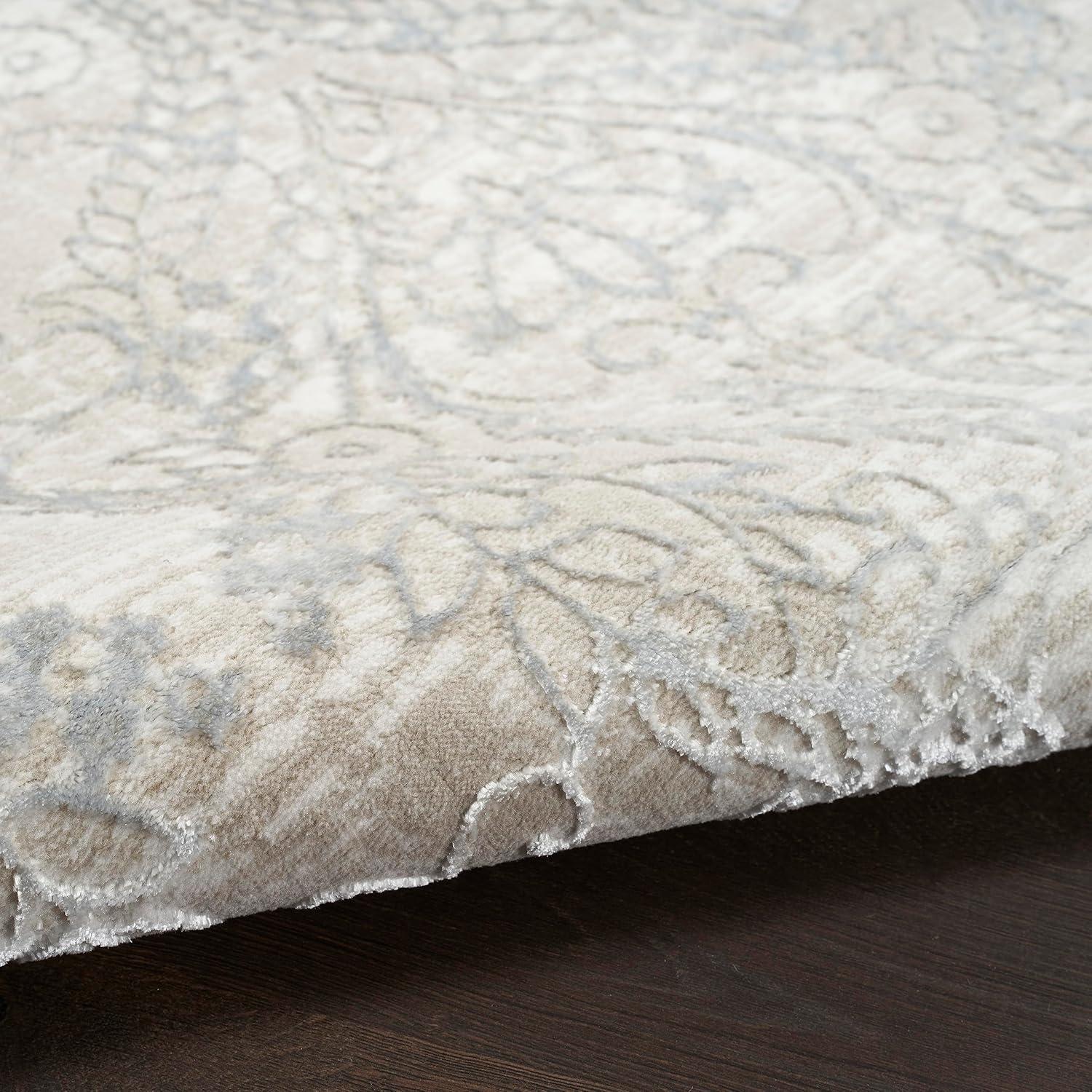 Iliana Damask Machine Woven Polyester Area Rug in Beige