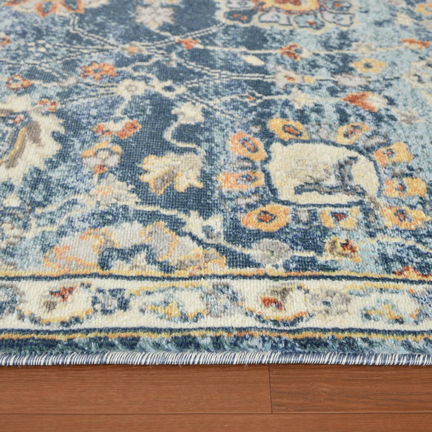 Bohemian Blue and Beige Synthetic 5' x 7' Area Rug