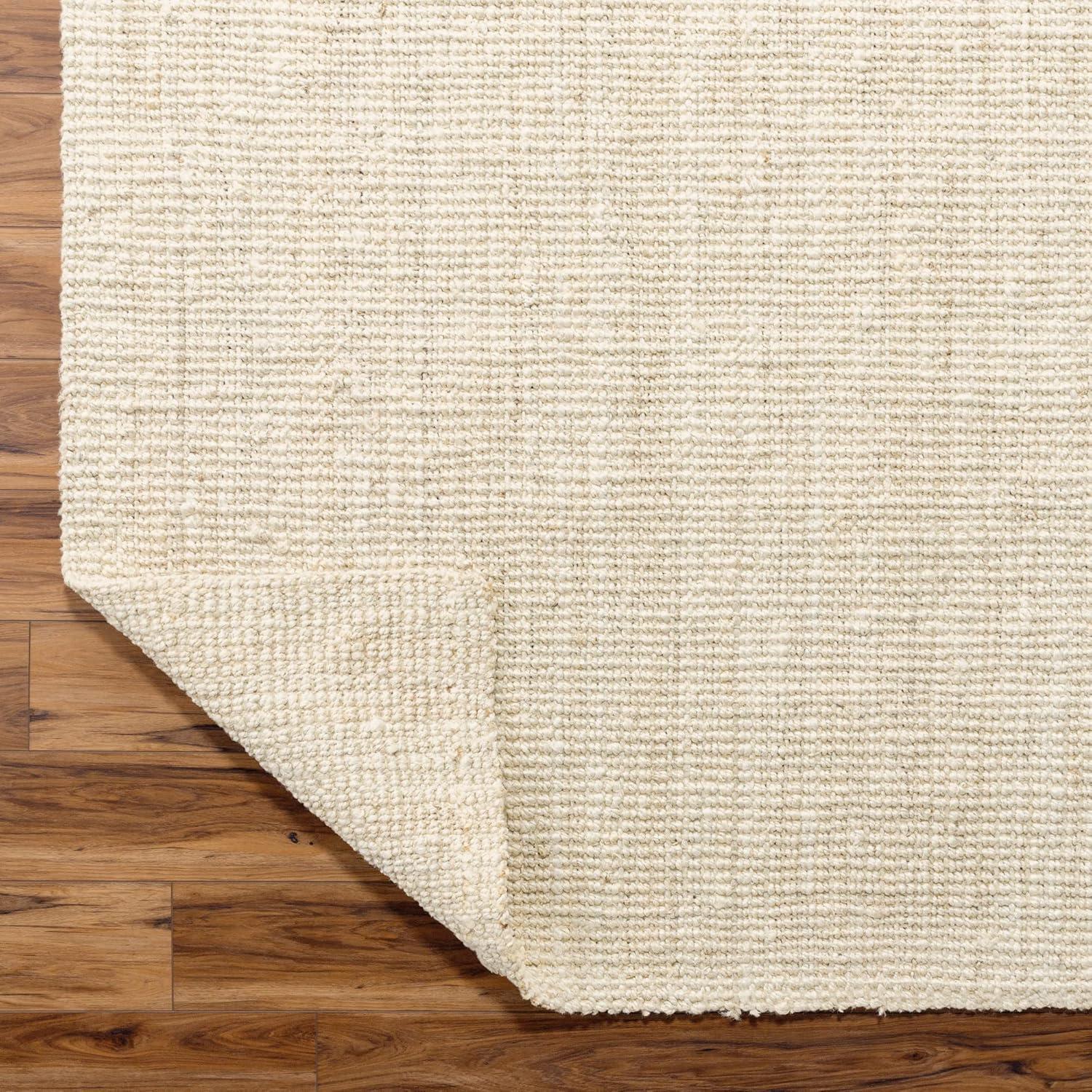 Calla Ivory Handwoven Jute 7'6" x 9'6" Area Rug